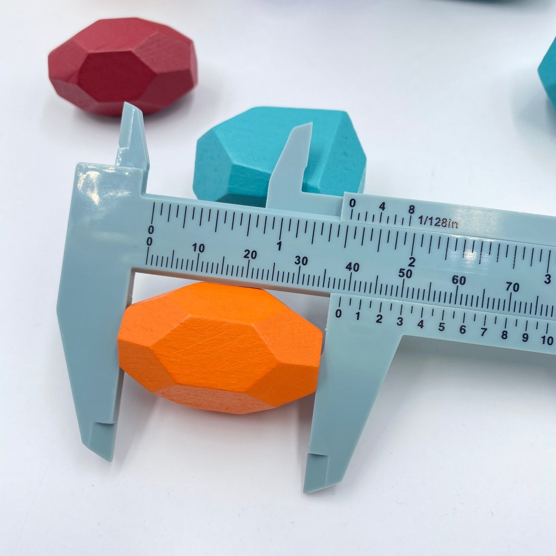 16 Pcs Wooden Stone Balancing Stacking Blocks in Primary Colors - The Nurturing Nook