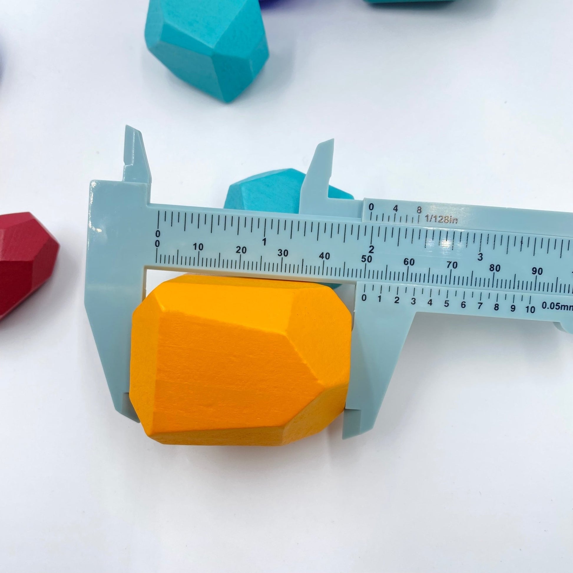 16 Pcs Wooden Stone Balancing Stacking Blocks in Primary Colors - The Nurturing Nook