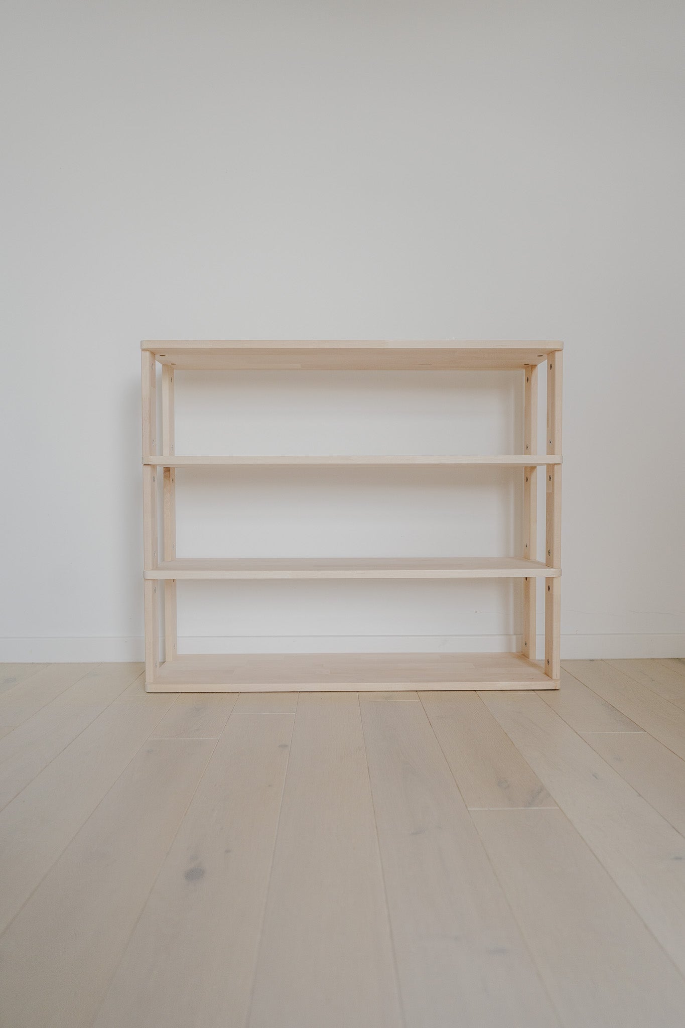 Handmade solid wood Montessori shelf, made to grow with your child