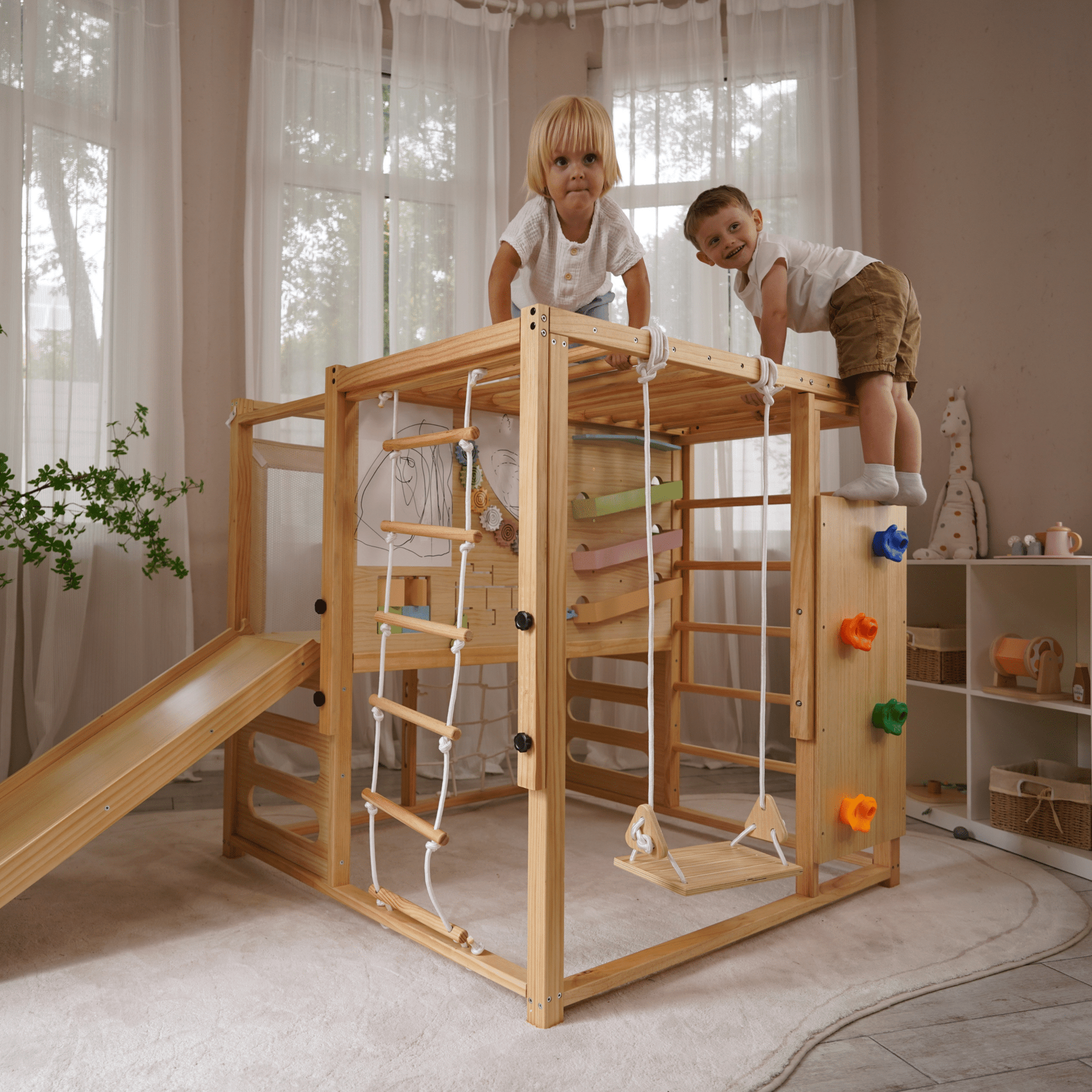 Alpine indoor climbing gym with slide and climbing wall - The Nurturing Nook