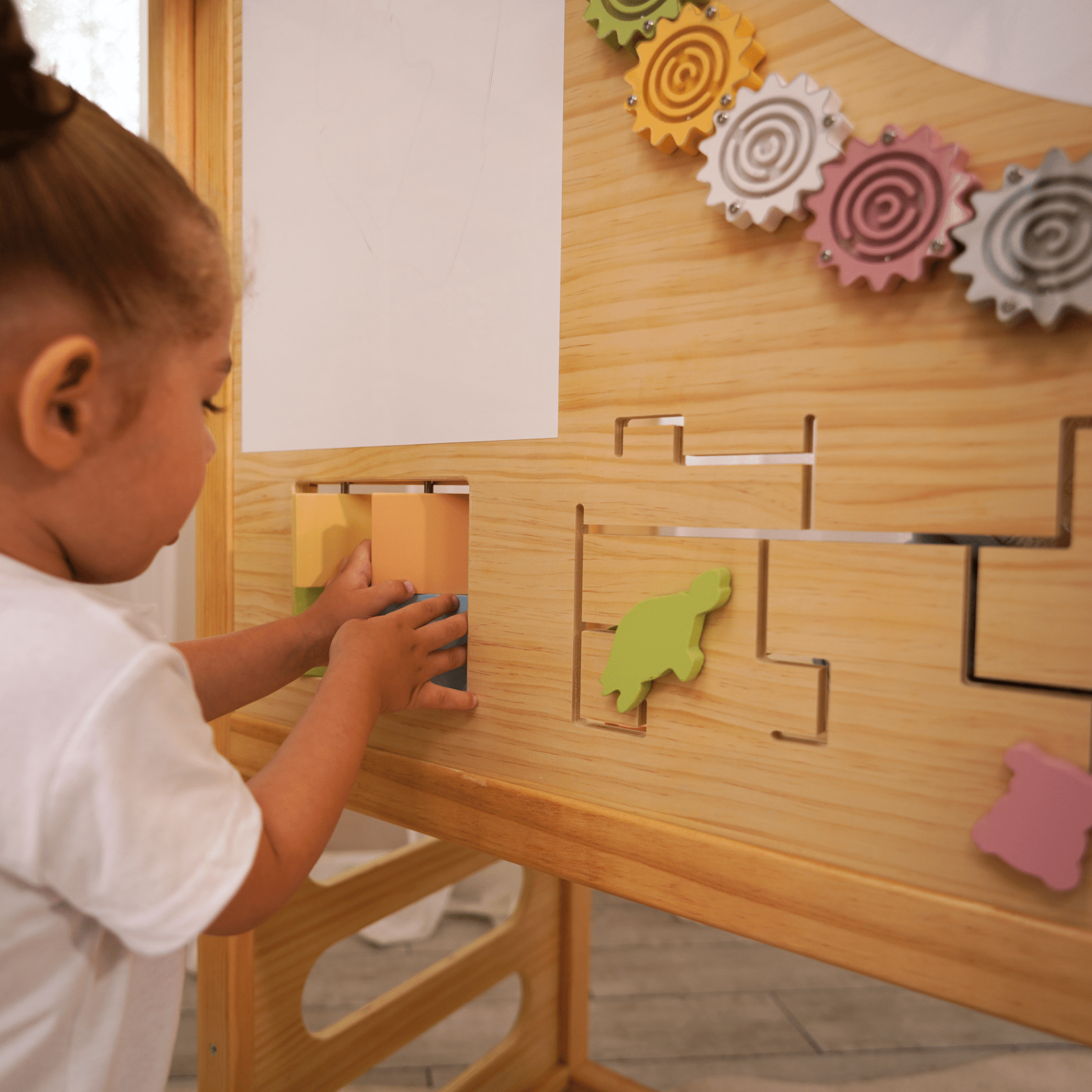 Alpine indoor climbing gym with slide and climbing wall - The Nurturing Nook