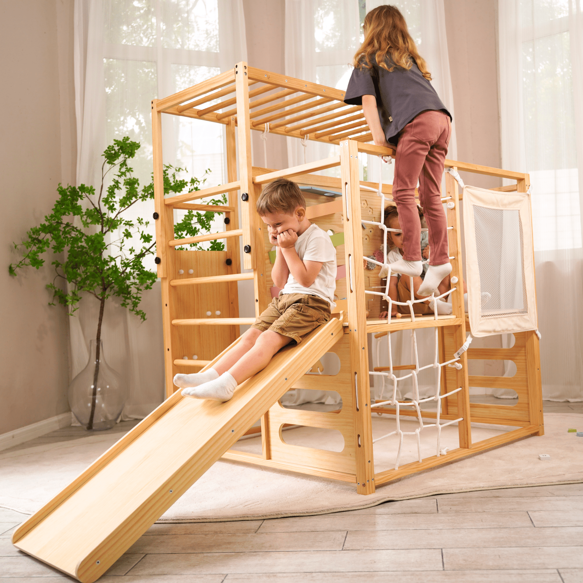 Alpine indoor climbing gym with slide and climbing wall - The Nurturing Nook