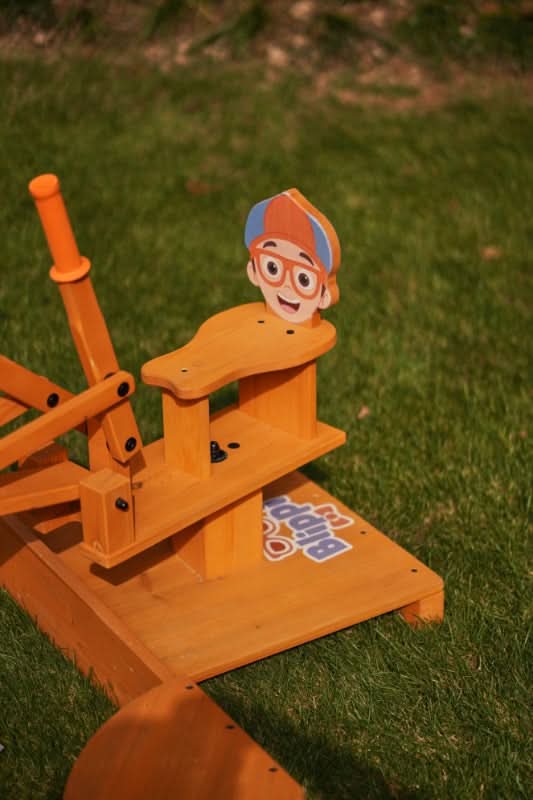 Blippi excavator wooden ride - on for pretend outdoor play - The Nurturing Nook