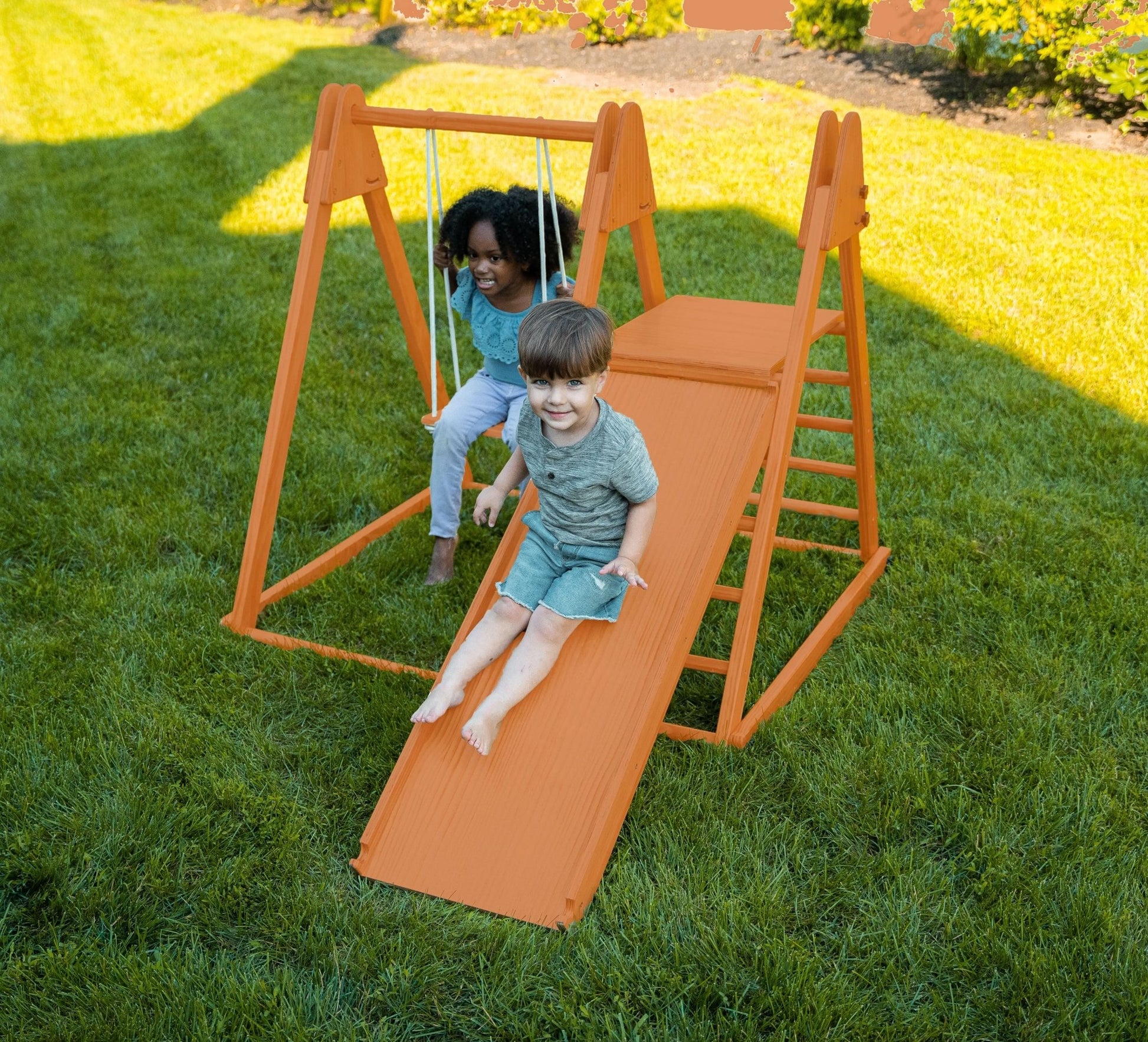 Foldable playset with slide, swings & rock wall - The Nurturing Nook