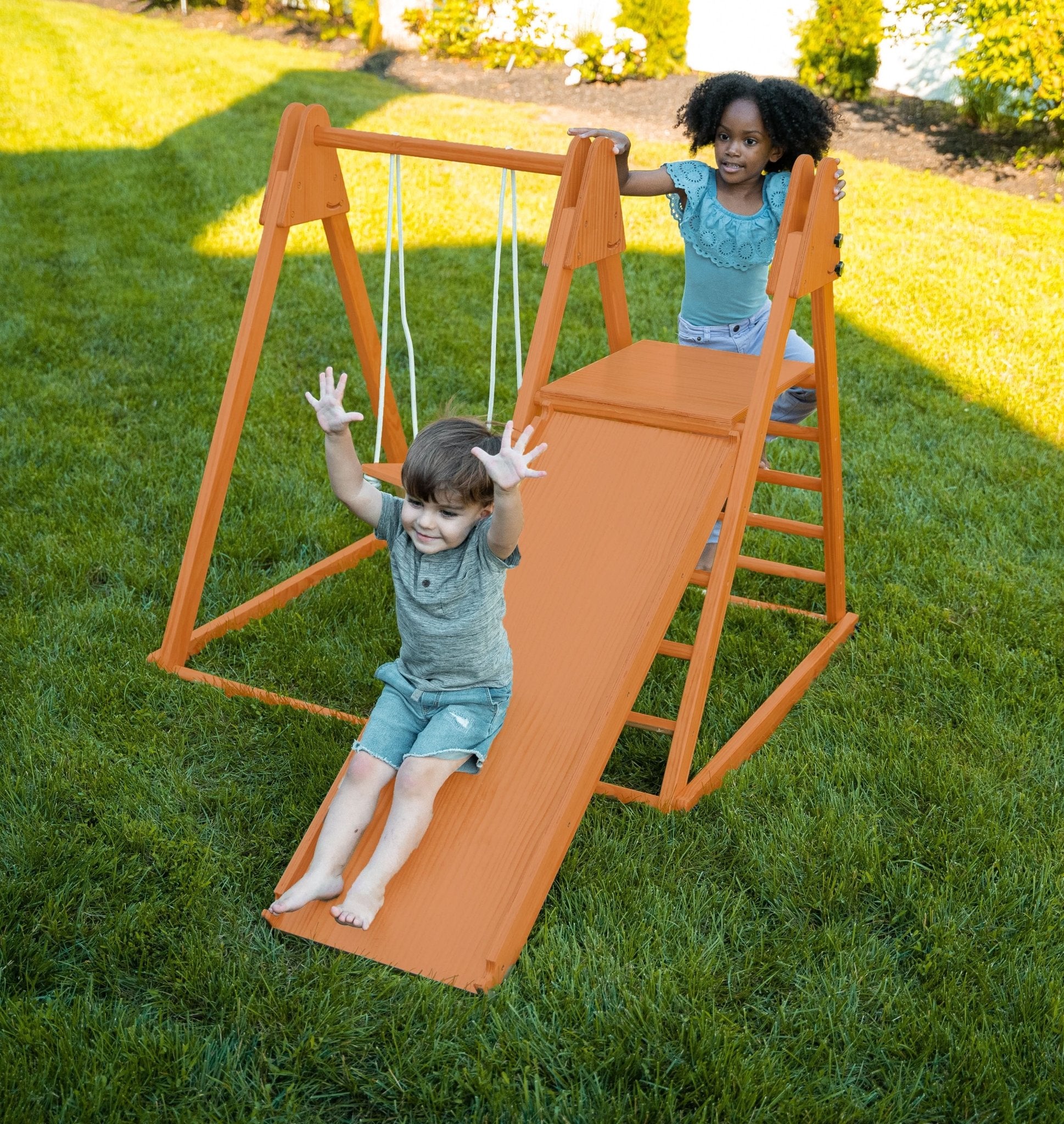 Foldable playset with slide, swings & rock wall - The Nurturing Nook