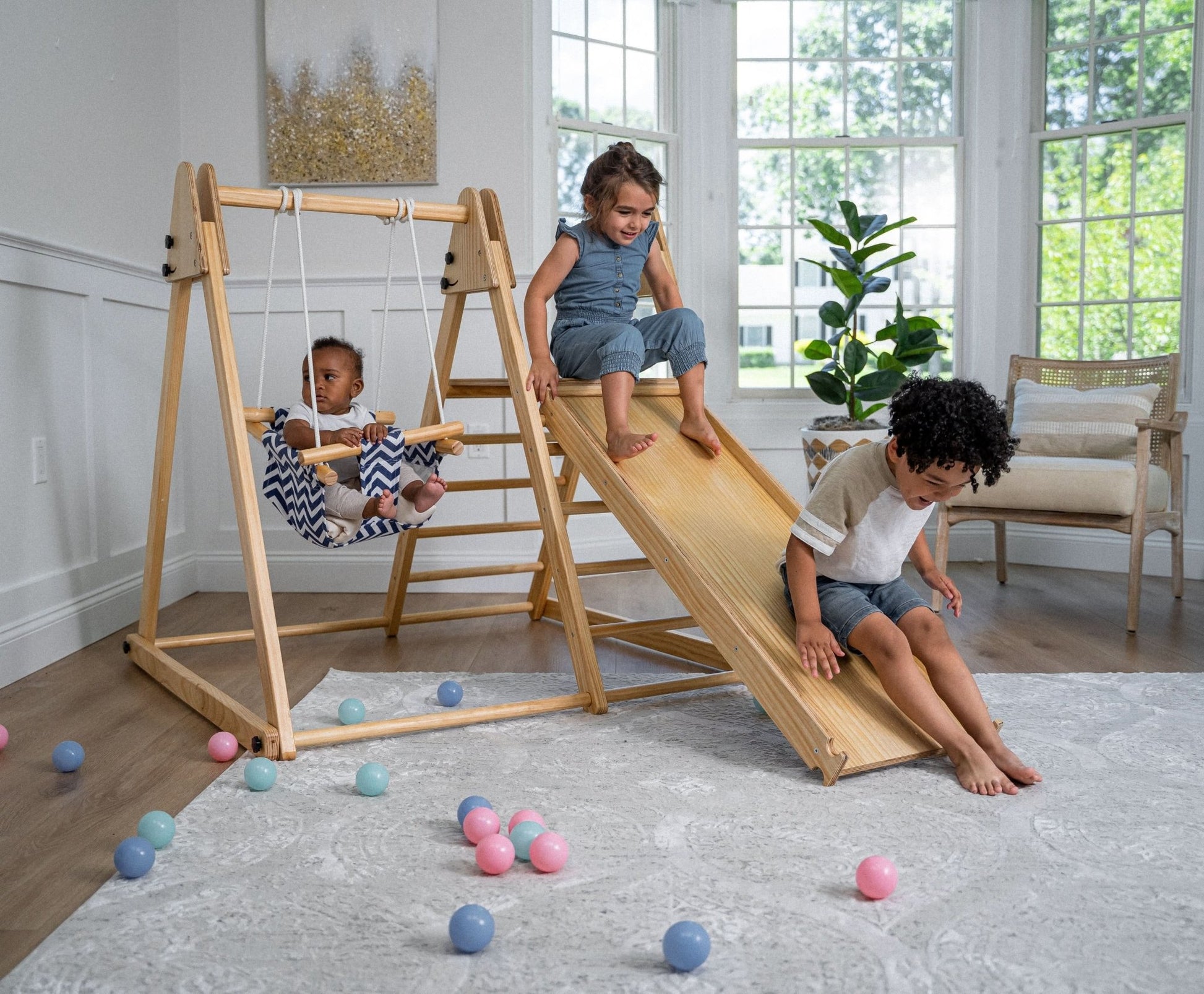 Foldable playset with slide, swings & rock wall - The Nurturing Nook