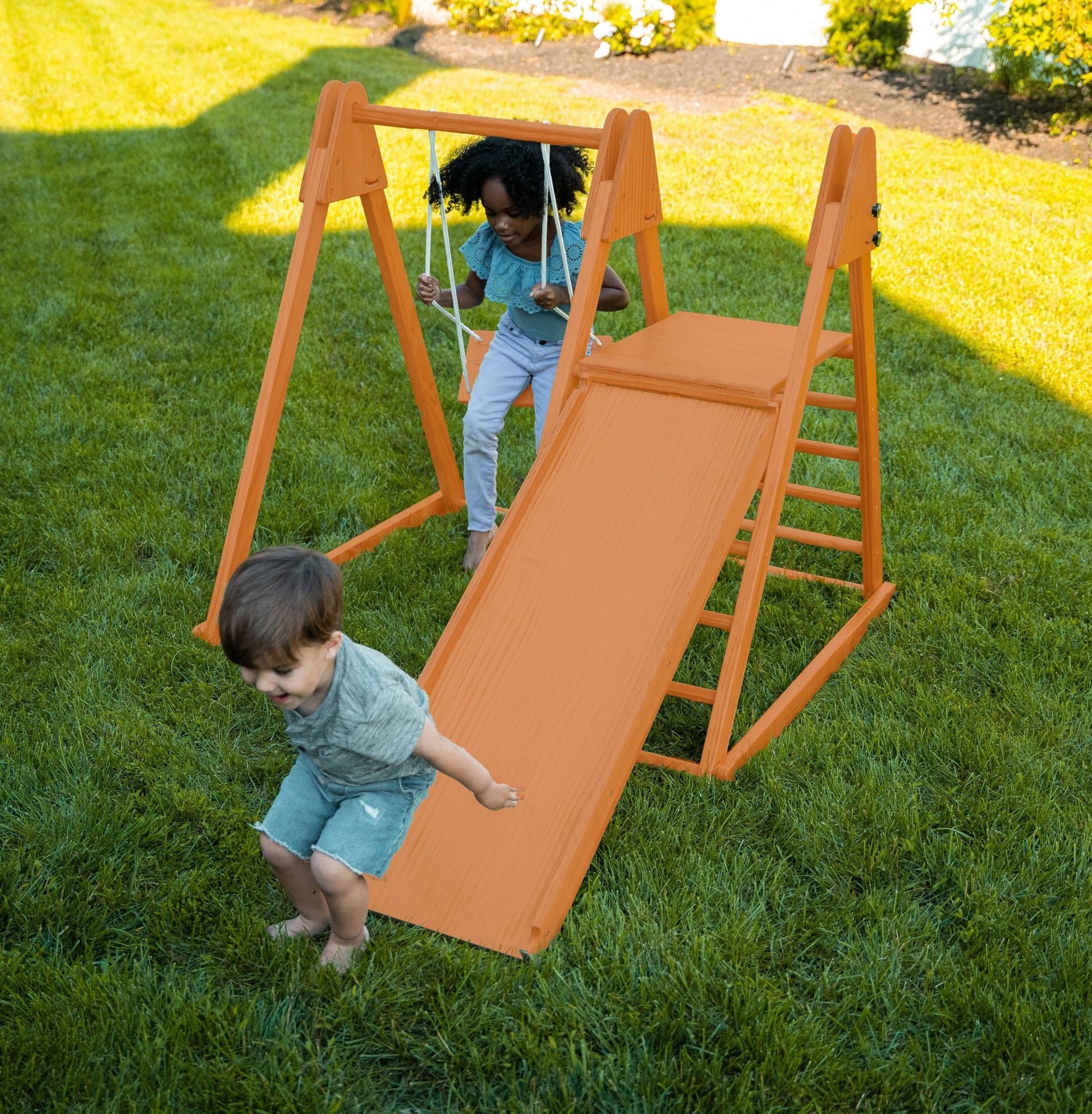 Foldable playset with slide, swings & rock wall - The Nurturing Nook