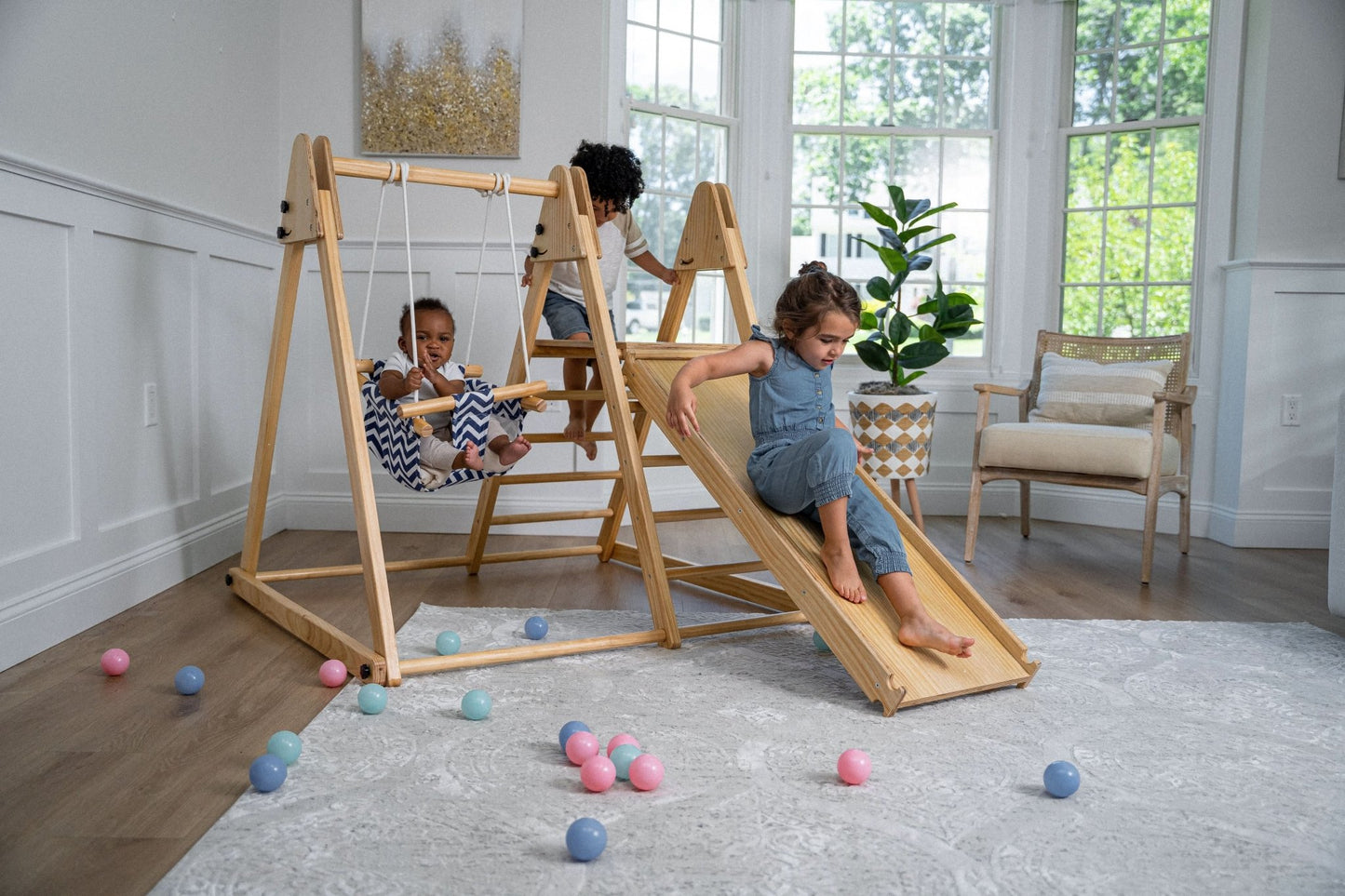 Foldable playset with slide, swings & rock wall - The Nurturing Nook