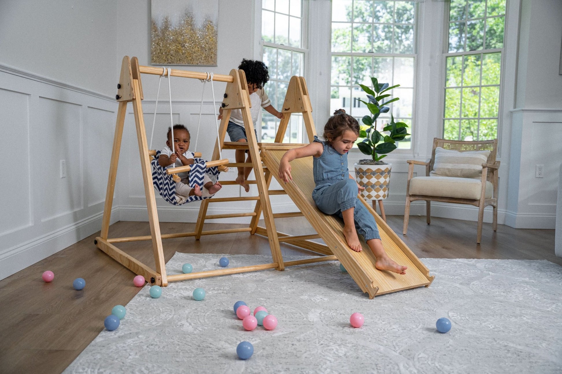 Foldable playset with slide, swings & rock wall - The Nurturing Nook