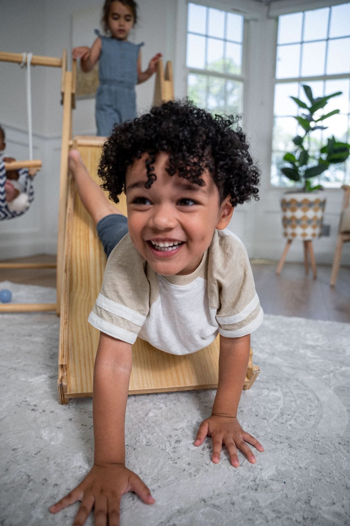 Foldable playset with slide, swings & rock wall - The Nurturing Nook