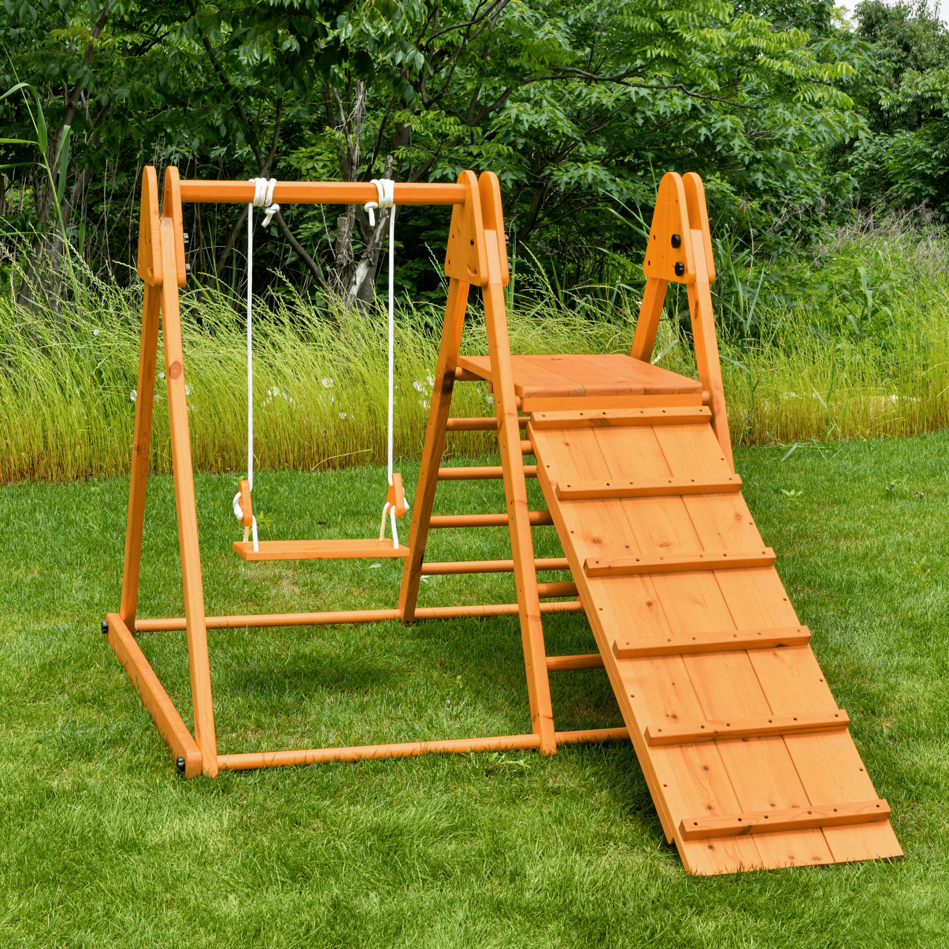 Foldable playset with slide, swings & rock wall - The Nurturing Nook