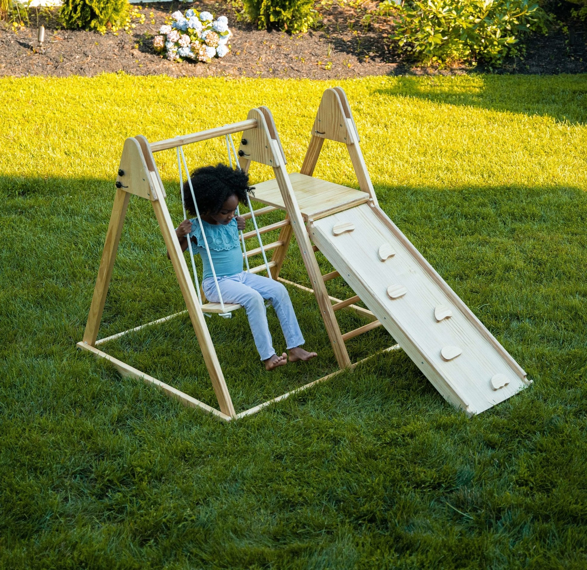 Foldable playset with slide, swings & rock wall - The Nurturing Nook