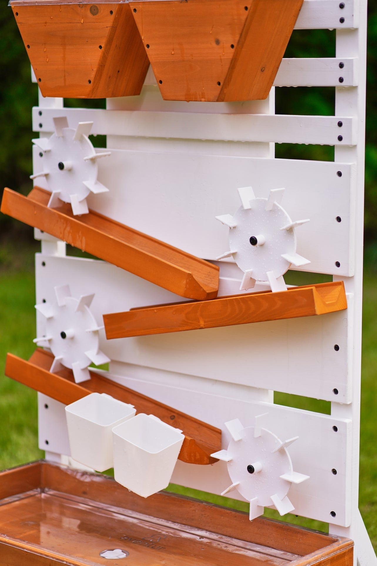 Large wooden water table – play station with water wheels - The Nurturing Nook