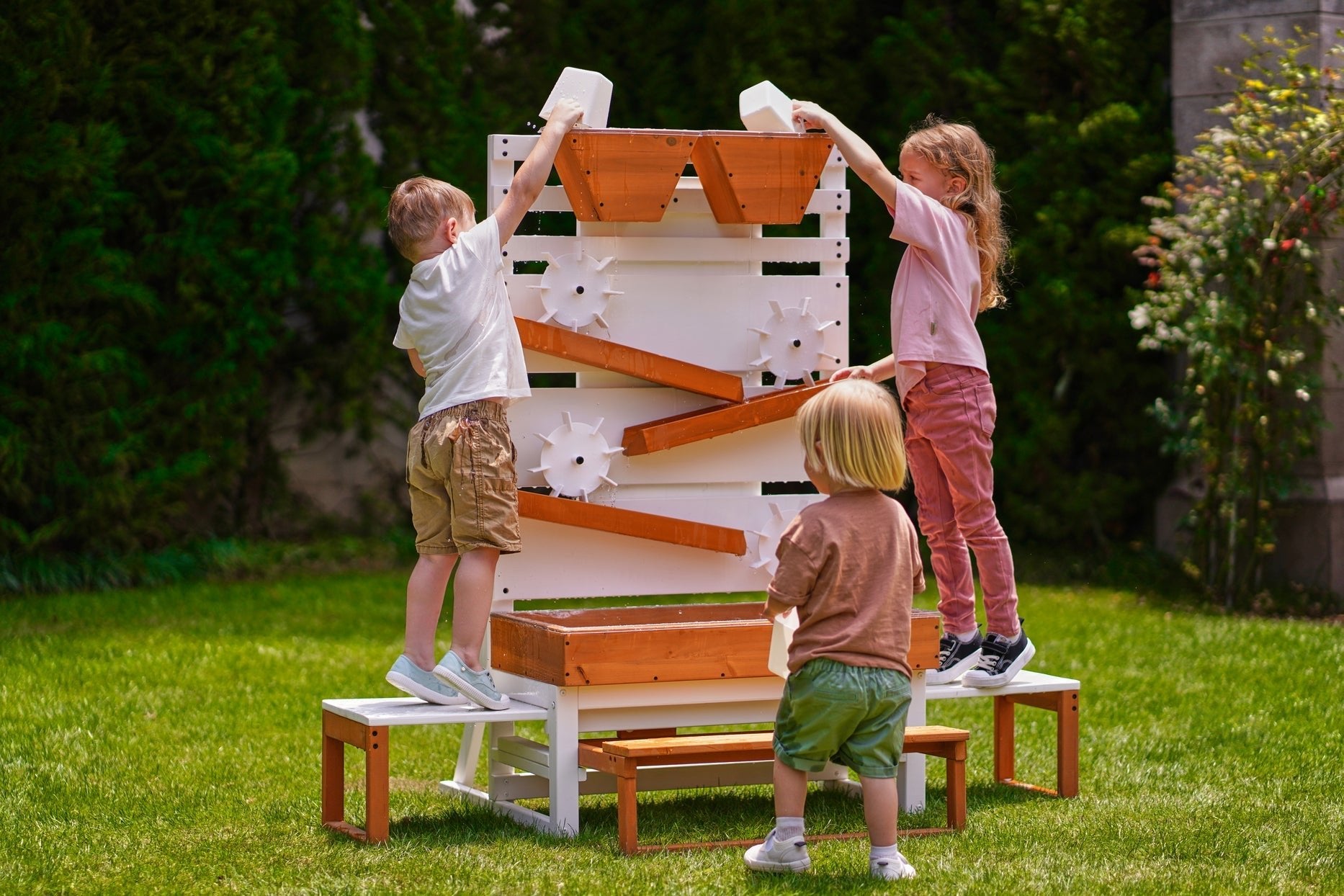 Large wooden water table – play station with water wheels - The Nurturing Nook