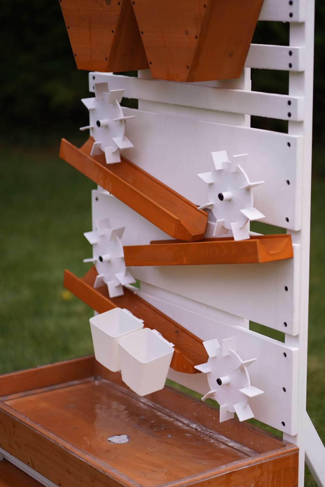 Large wooden water table – play station with water wheels - The Nurturing Nook