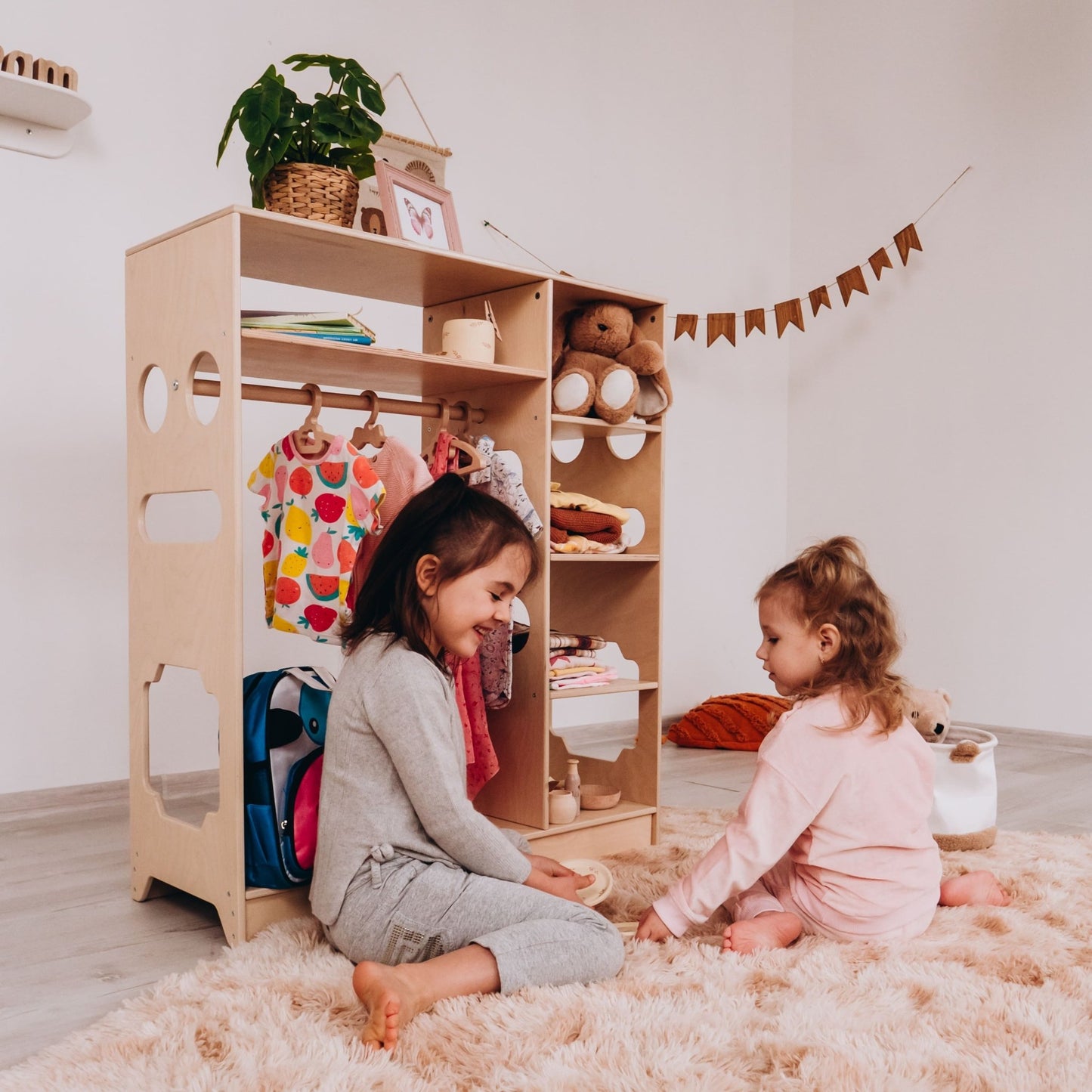Montessori closet – 4 - shelf kids wardrobe with clothing rack - The Nurturing Nook