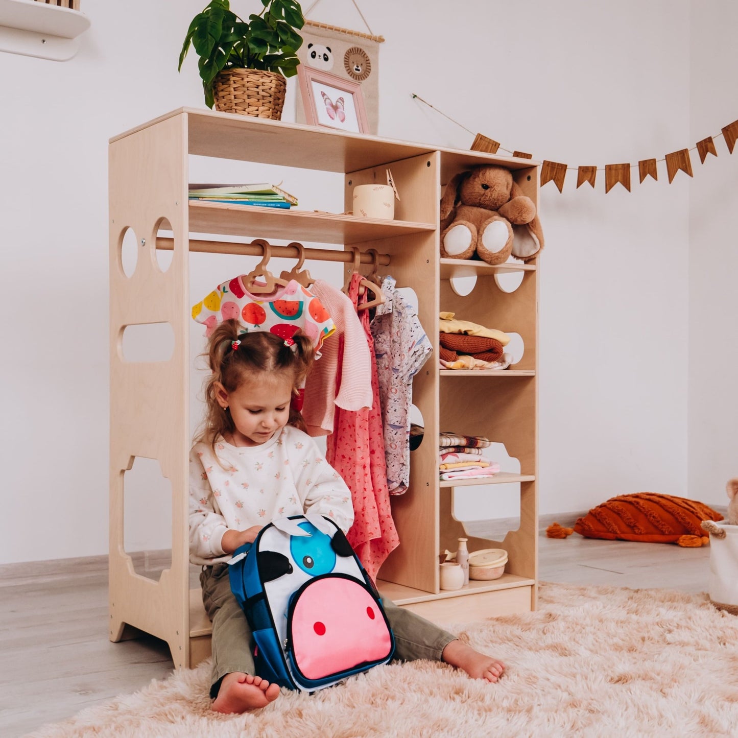 Montessori closet – 4 - shelf kids wardrobe with clothing rack - The Nurturing Nook