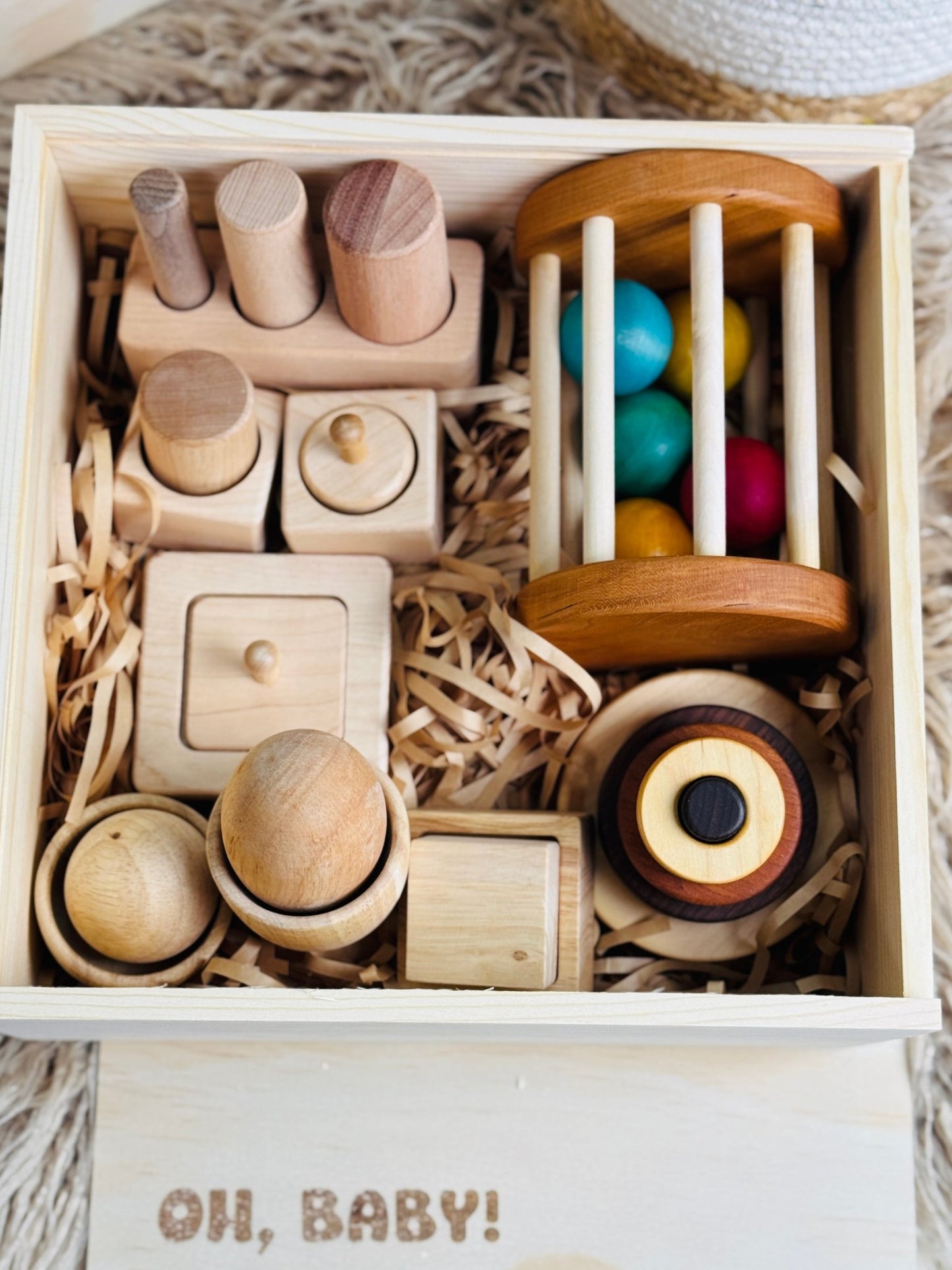 Montessori essentials gift box for 6 - 12 months – baby milestone gift with developmental toys, perfect for half - year celebrations - The Nurturing Nook