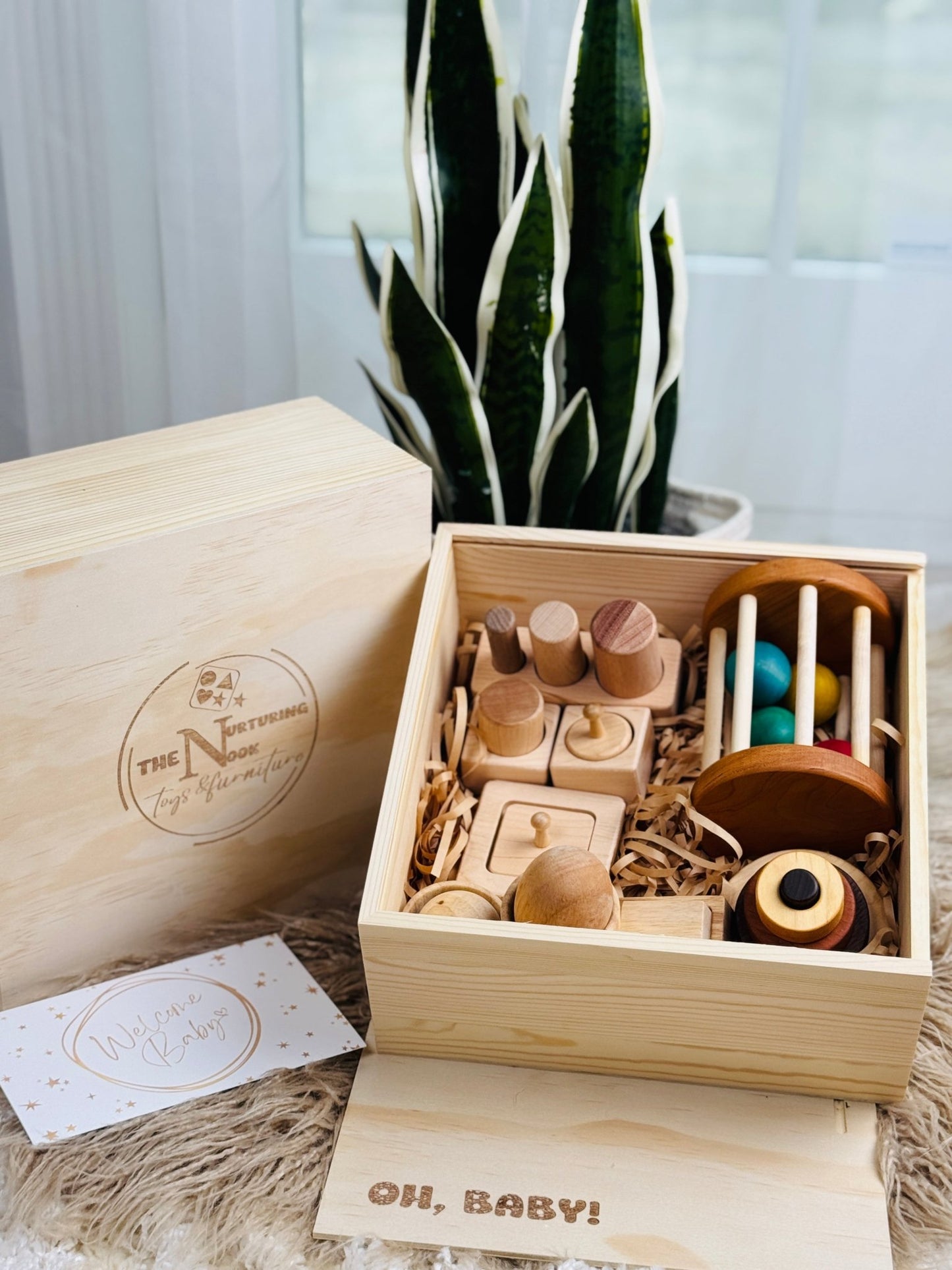 Montessori essentials gift box for 6 - 12 months – baby milestone gift with developmental toys, perfect for half - year celebrations - The Nurturing Nook
