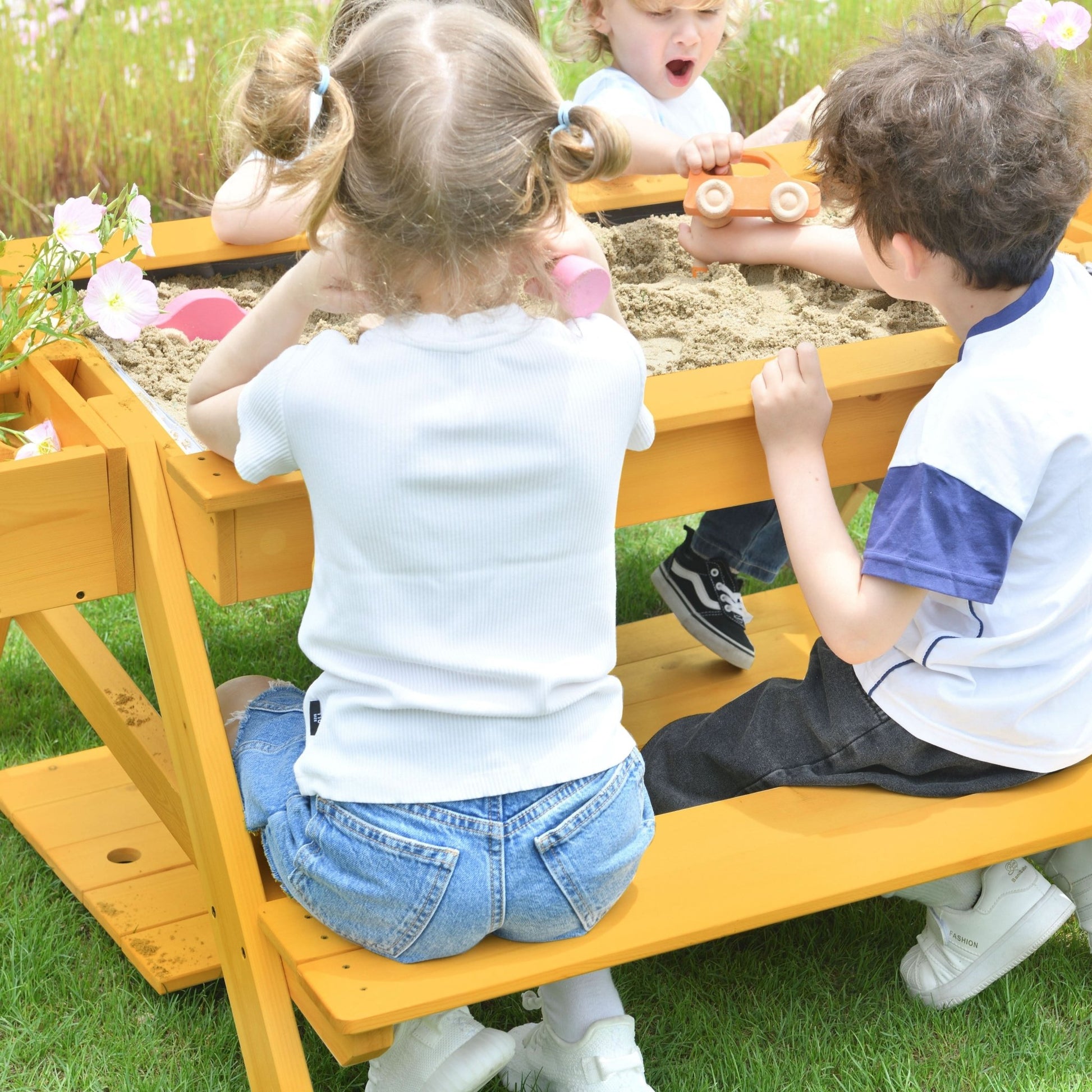 Outdoor wooden sand and picnic table set for sensory play - The Nurturing Nook