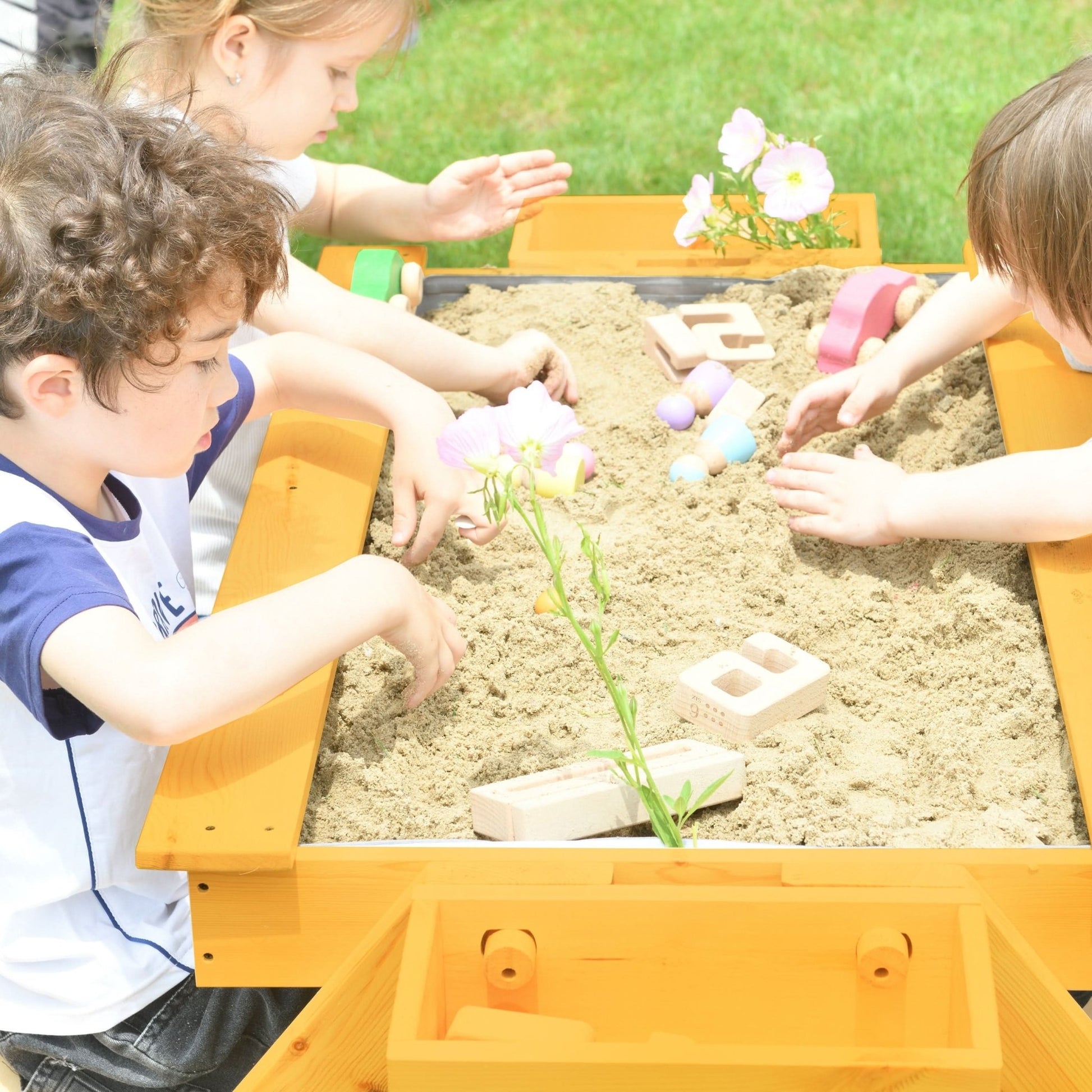 Outdoor wooden sand and picnic table set for sensory play - The Nurturing Nook