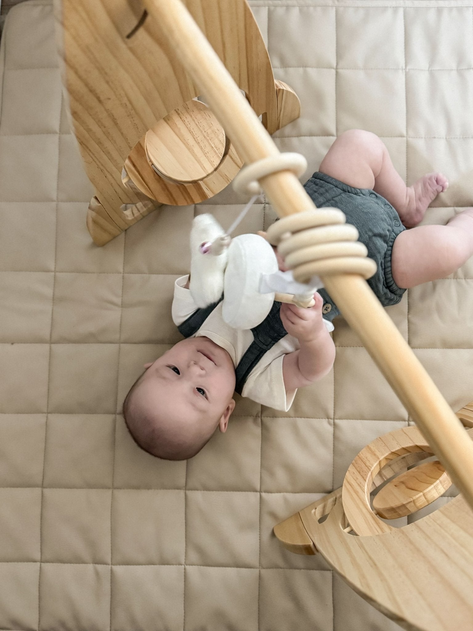 Rocket wooden baby gym for sensory and motor play - The Nurturing Nook