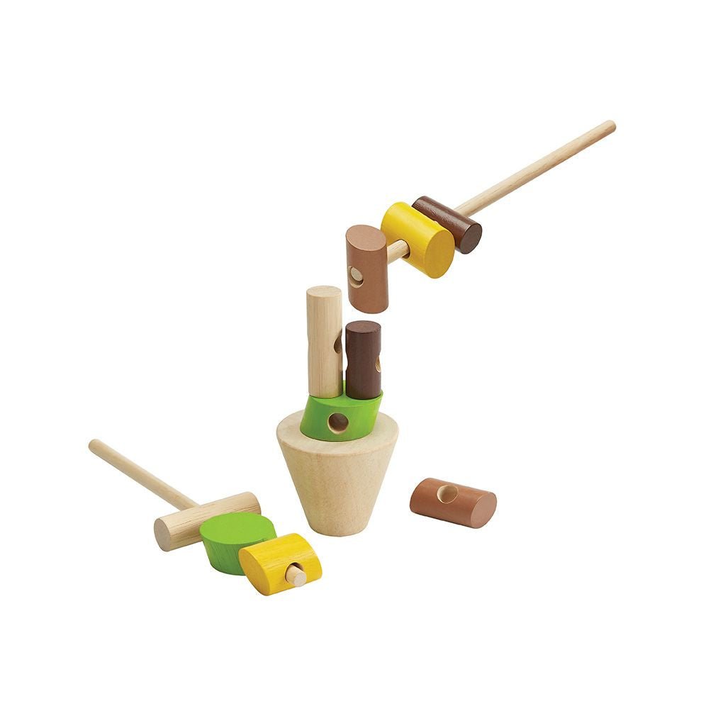 Stacking Logs - The Nurturing Nook