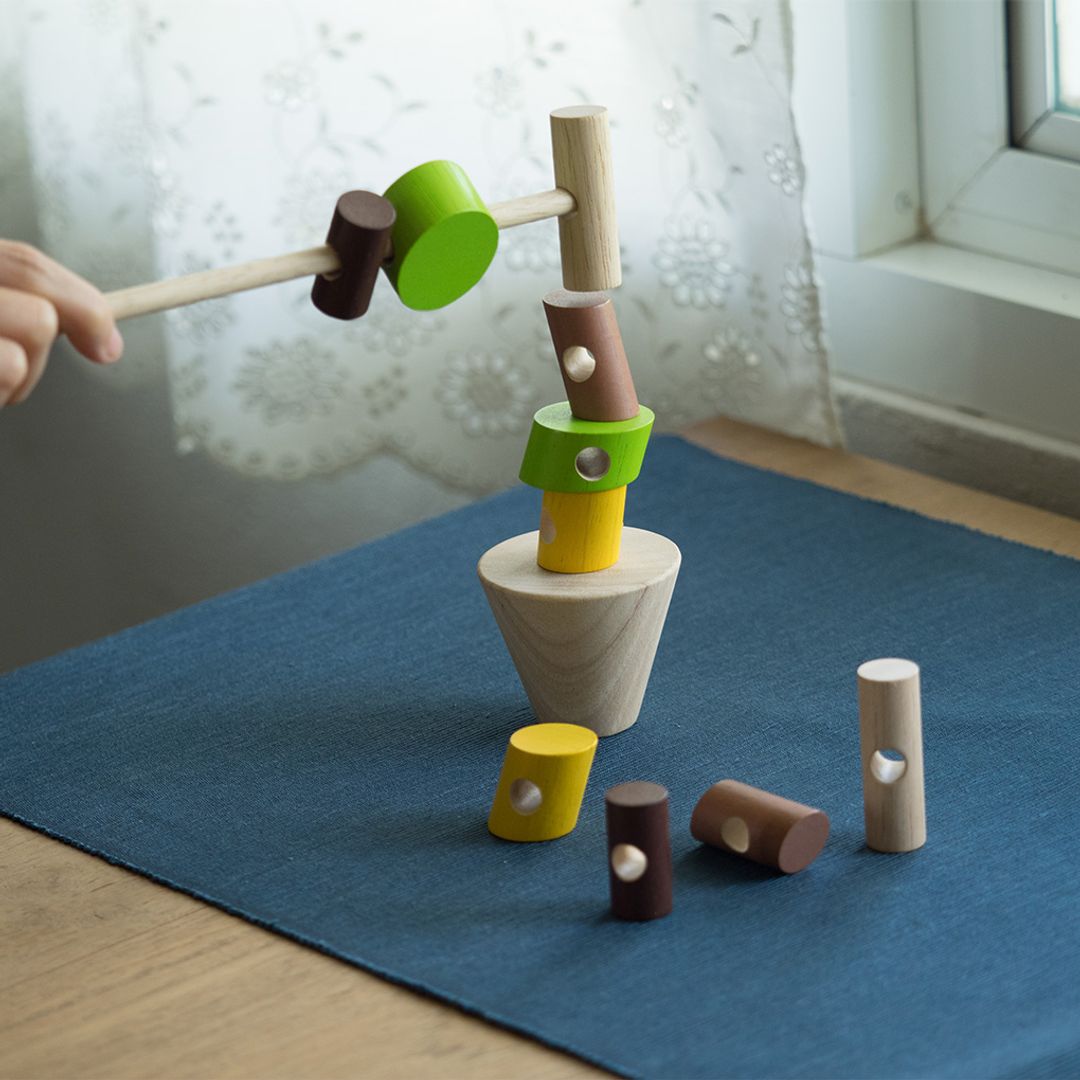 Stacking Logs - The Nurturing Nook