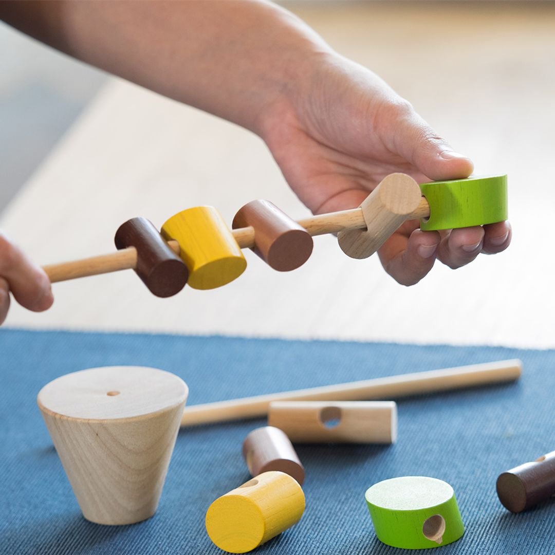 Stacking Logs - The Nurturing Nook