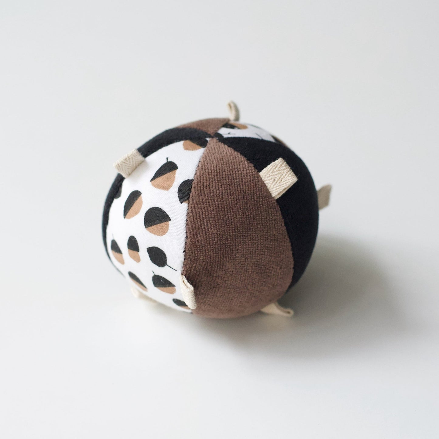 Taggy Ball with Rattle - Acorn - The Nurturing Nook