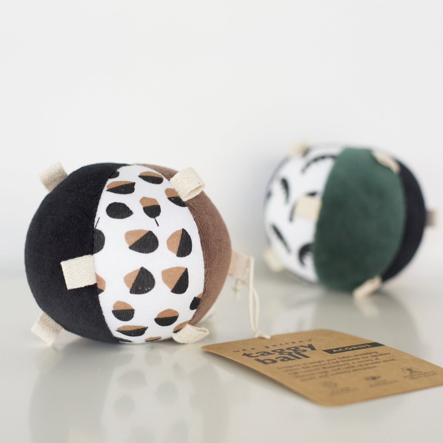 Taggy Ball with Rattle - Acorn - The Nurturing Nook