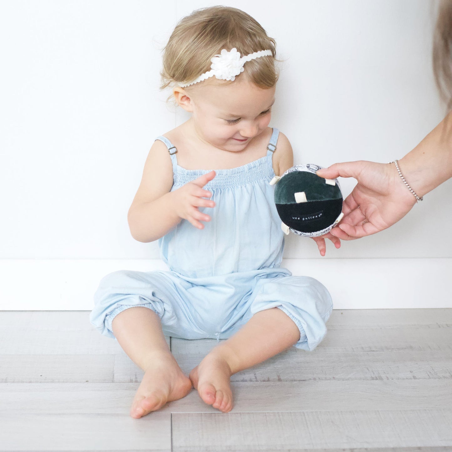 Taggy Ball with Rattle - Wild - The Nurturing Nook