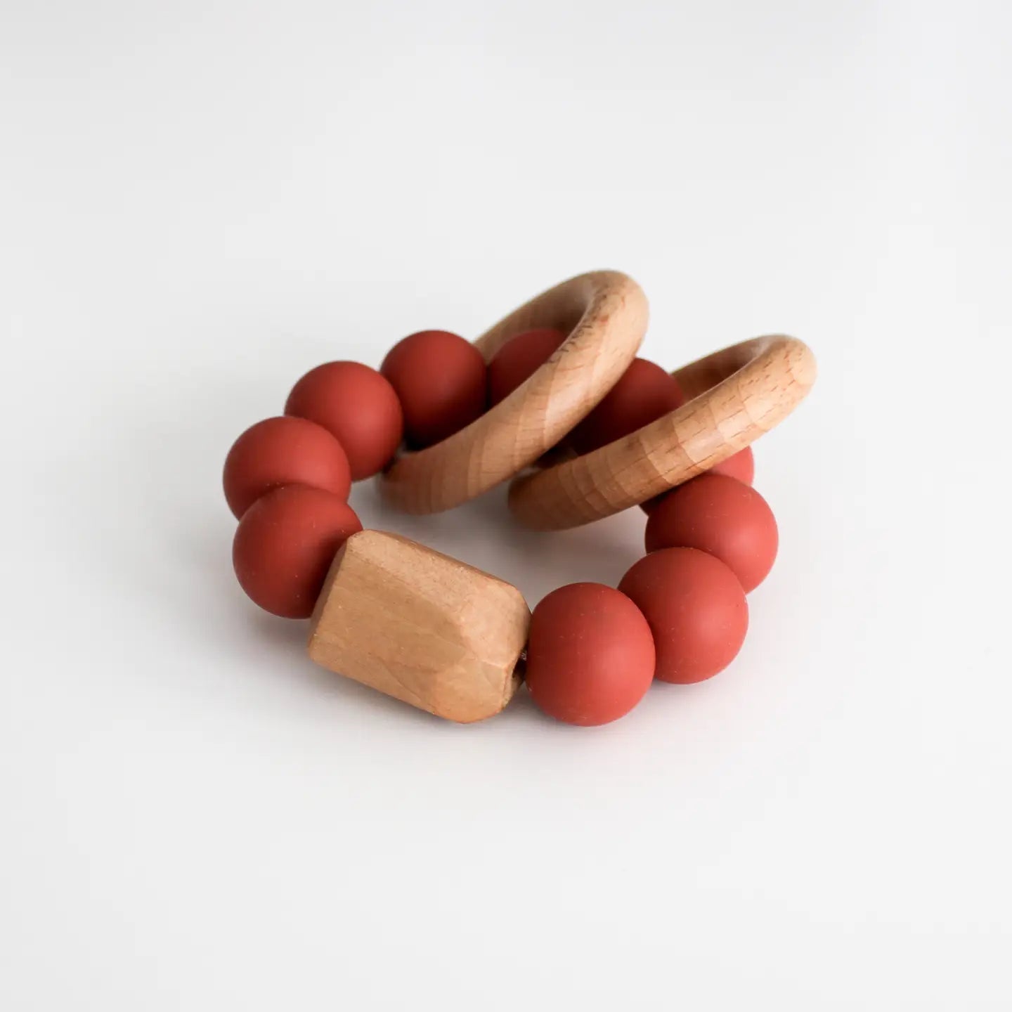 Teething Silicone Rattle with Wooden Rings - The Nurturing Nook