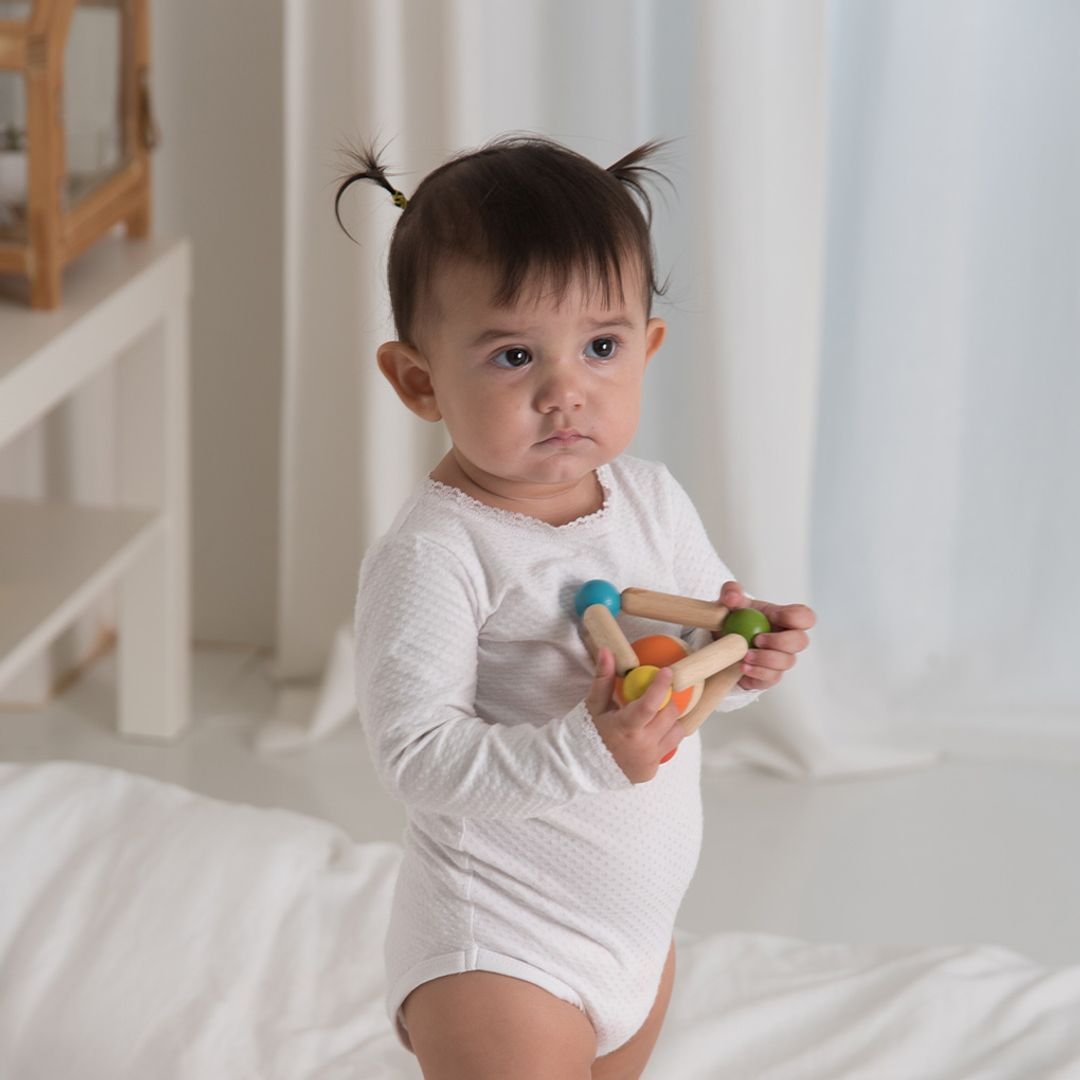 Triangle Clutching Toy - The Nurturing Nook