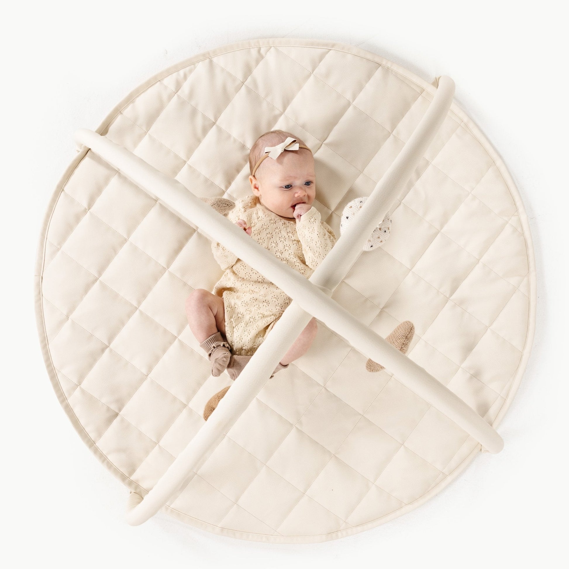 Vegan leather play gym with alpaca knit toys - The Nurturing Nook