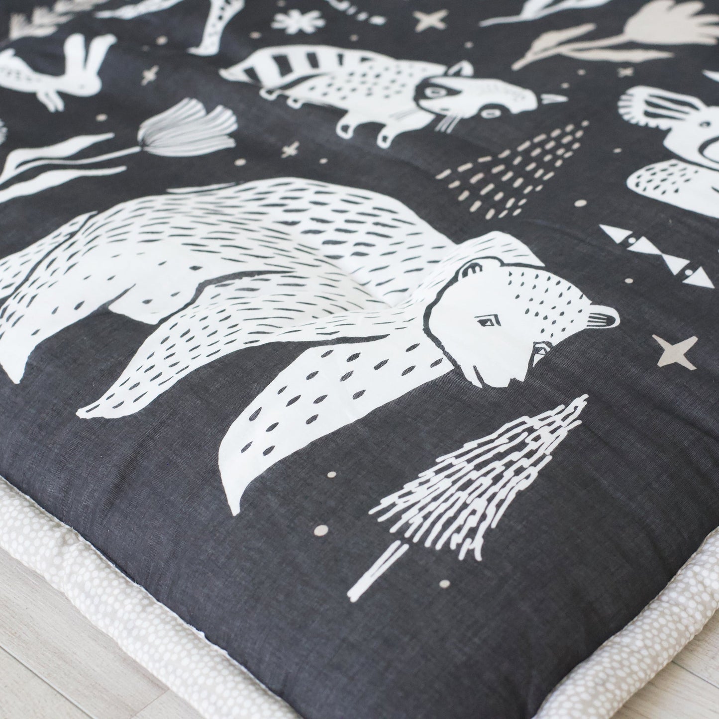 Wildlife reversible organic cotton playmat – forest, sea + plains - The Nurturing Nook