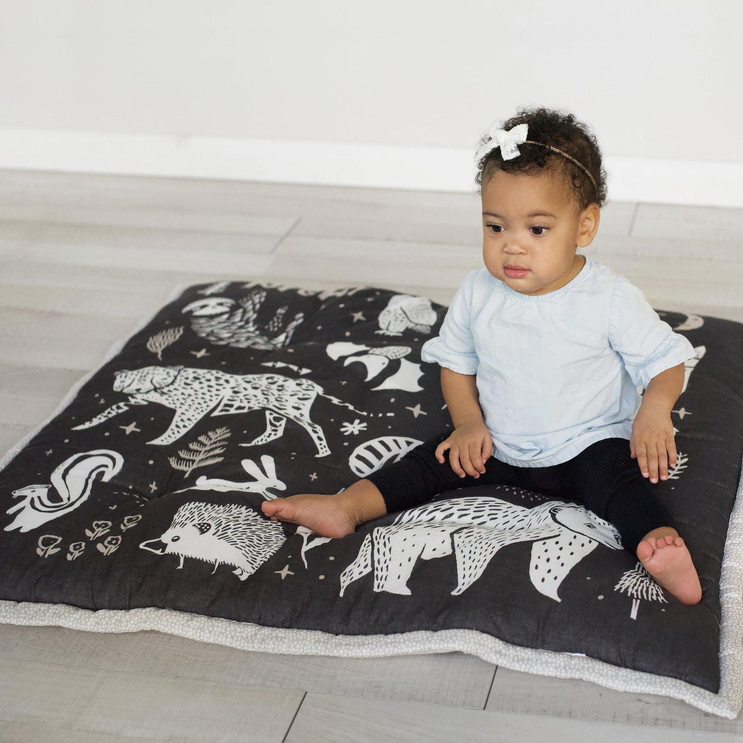 Wildlife reversible organic cotton playmat – forest, sea + plains - The Nurturing Nook