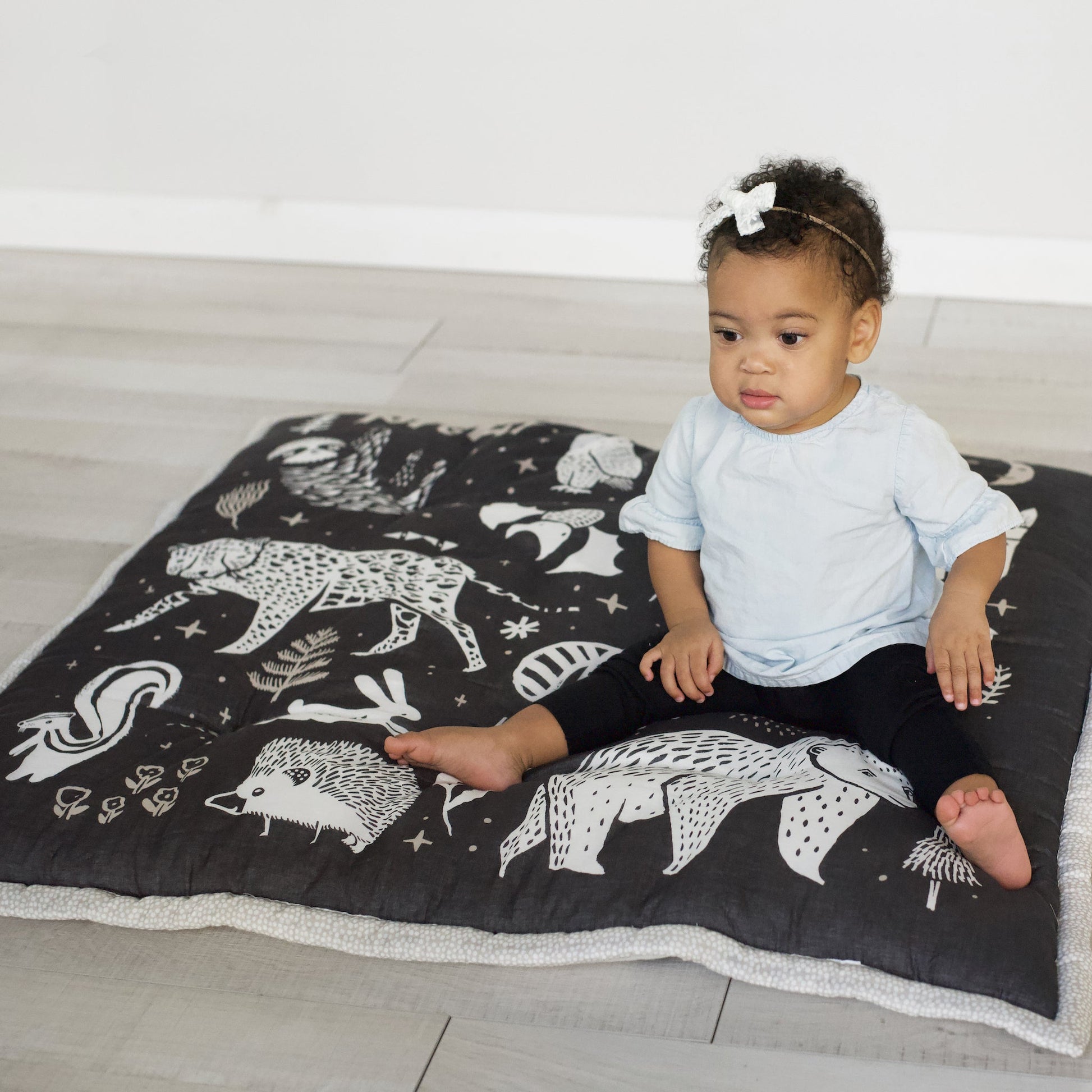 Wildlife reversible organic cotton playmat – forest, sea + plains - The Nurturing Nook