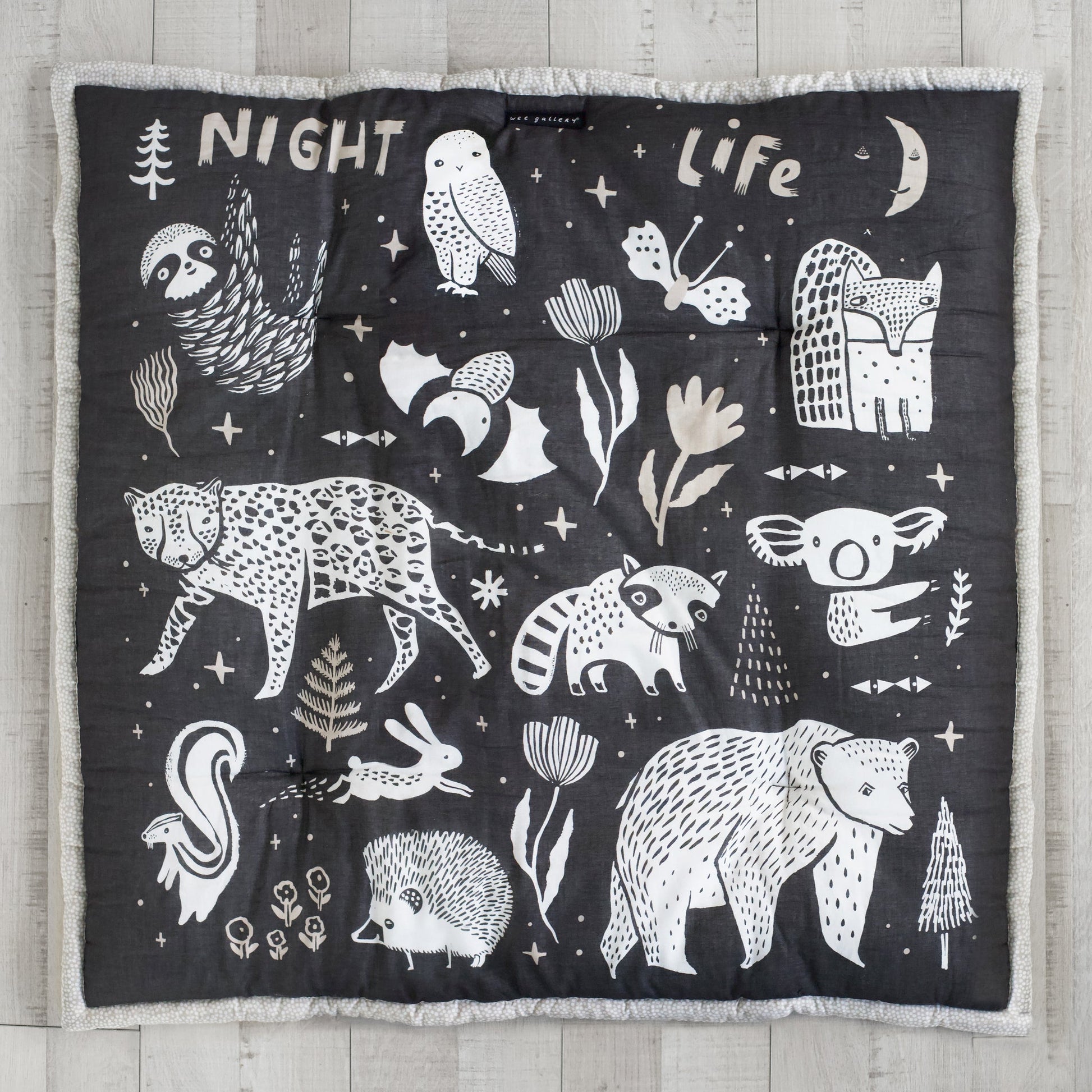 Wildlife reversible organic cotton playmat – forest, sea + plains - The Nurturing Nook