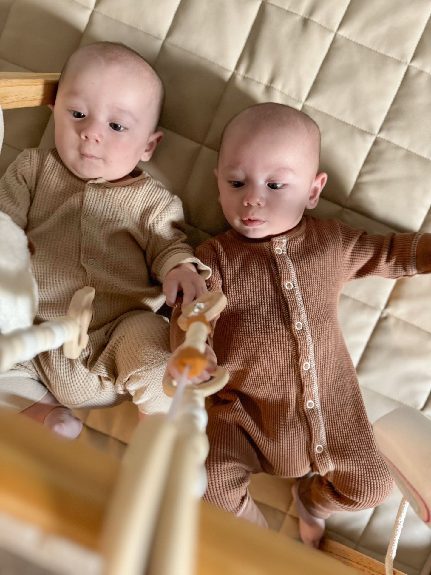 Wooden baby gym for sensory and motor play - The Nurturing Nook