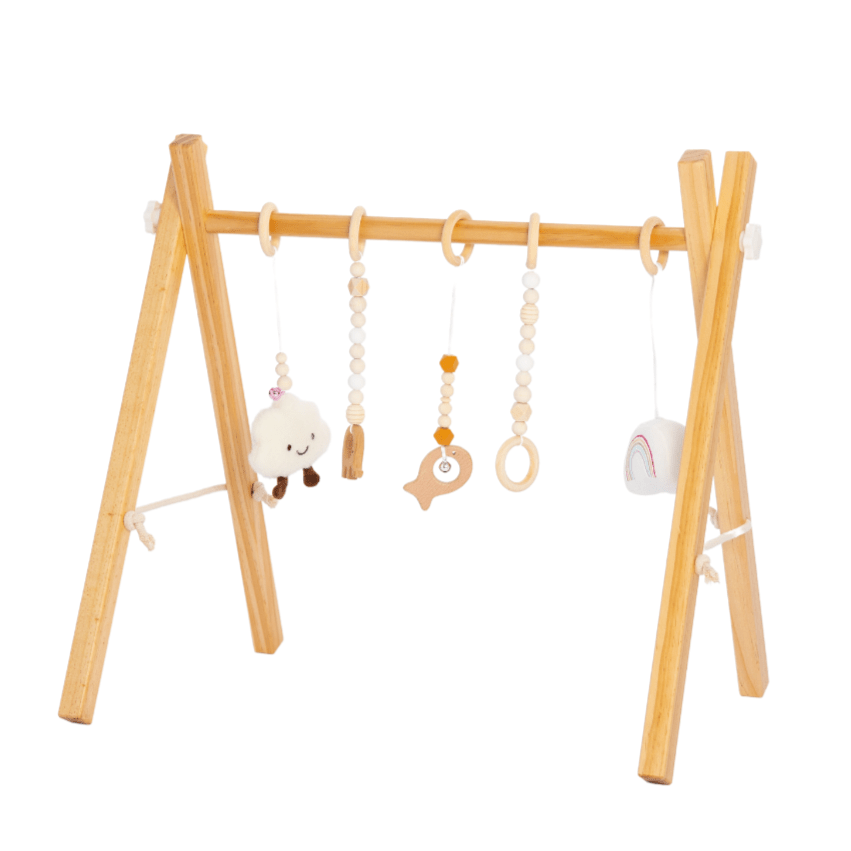 Wooden baby gym for sensory and motor play - The Nurturing Nook