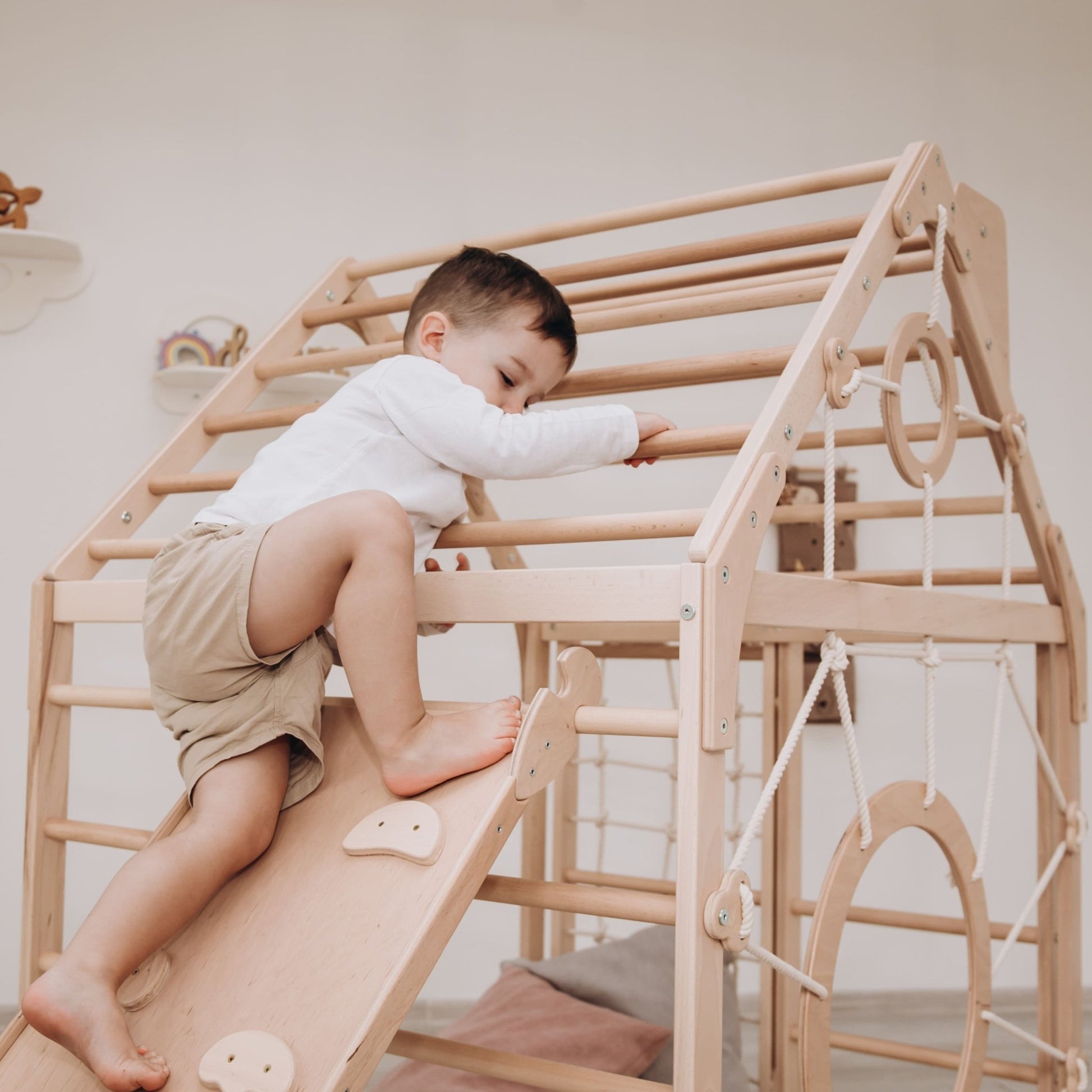 Wooden climbing playhouse – indoor climber & play space - The Nurturing Nook