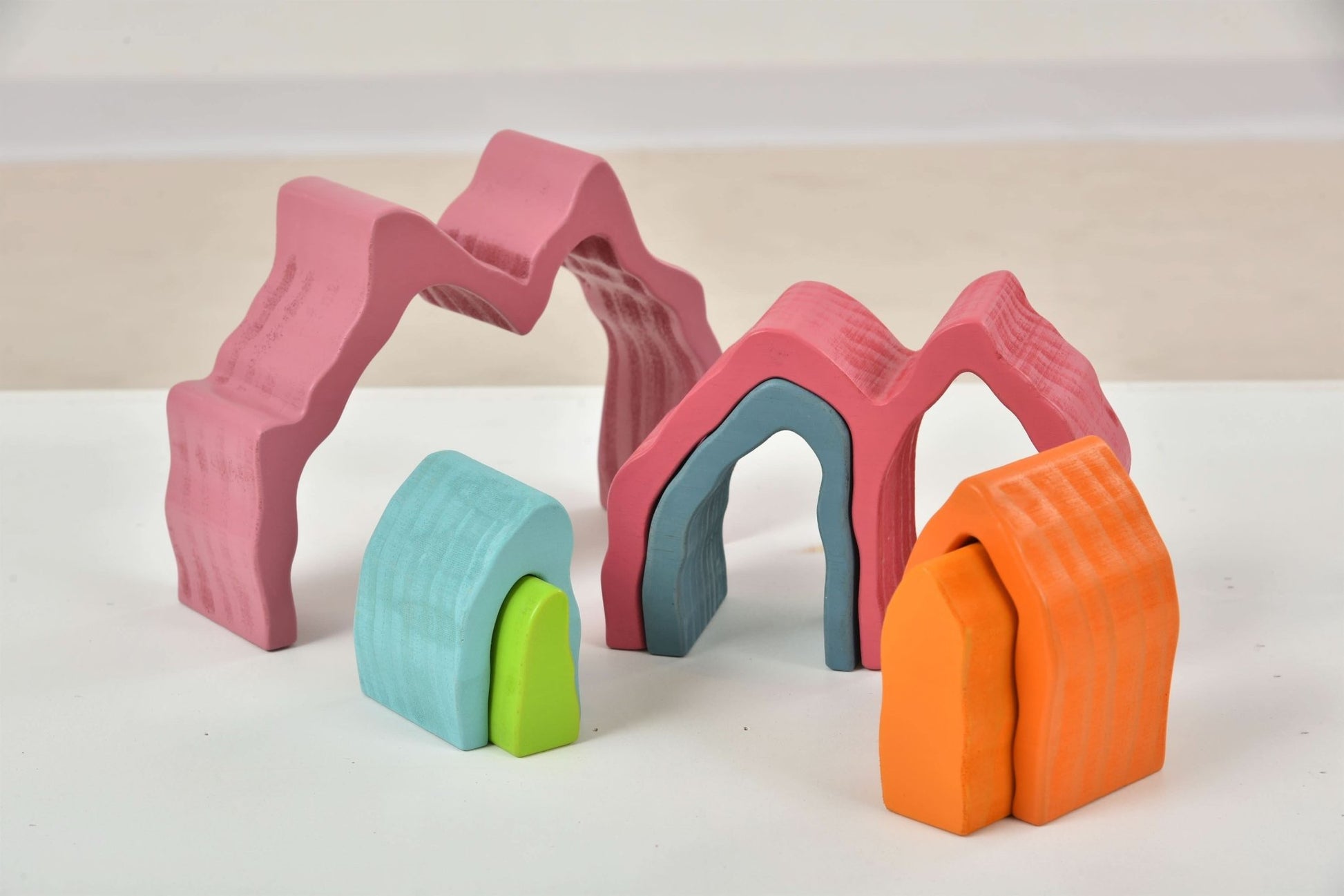 Wooden mountain rainbow stacker toy puzzle blocks - The Nurturing Nook