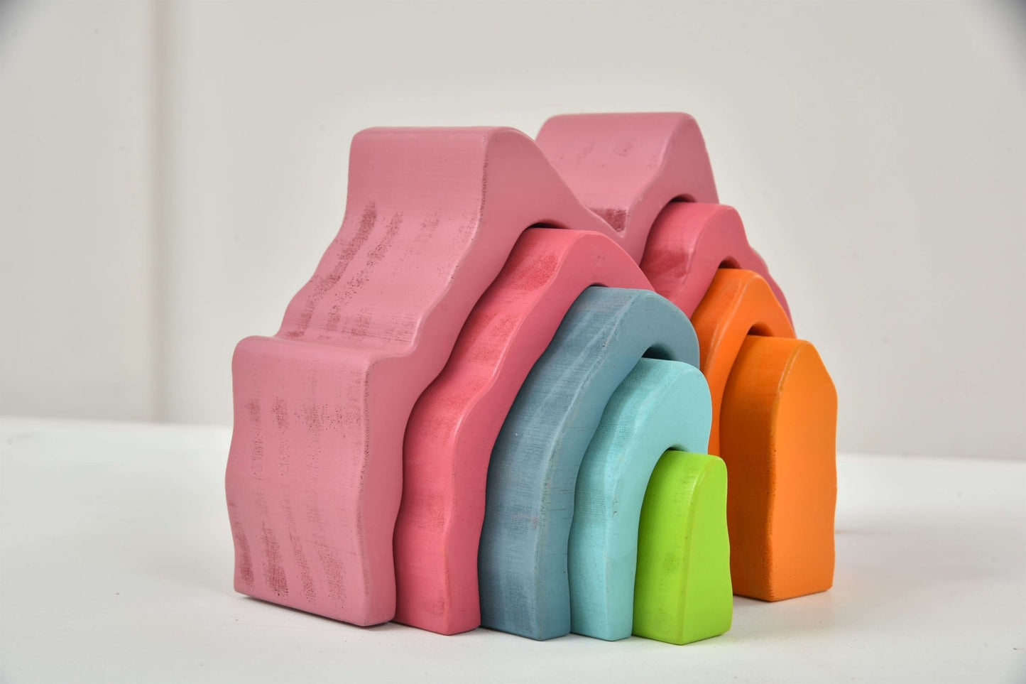 Wooden mountain rainbow stacker toy puzzle blocks - The Nurturing Nook