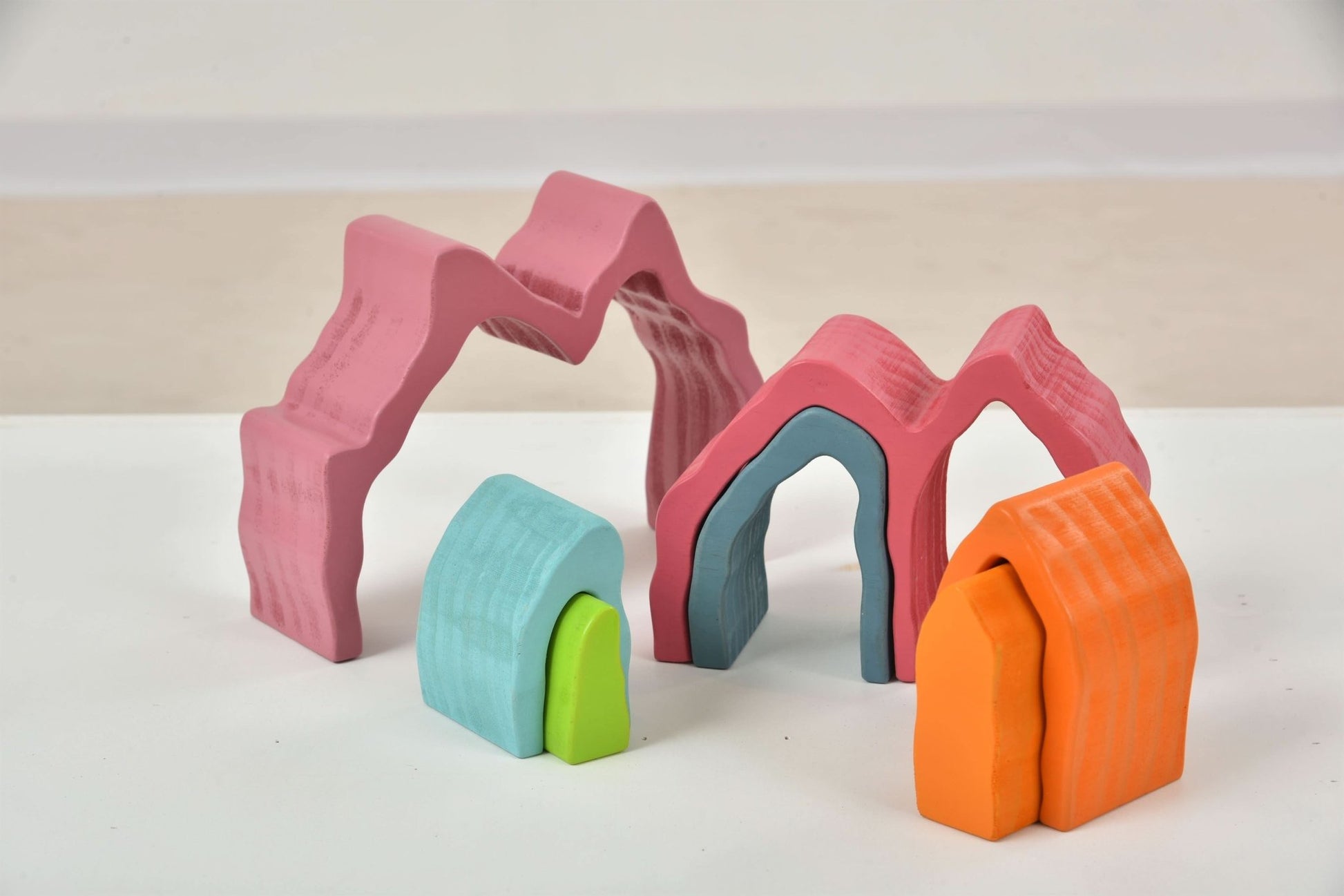 Wooden mountain rainbow stacker toy puzzle blocks - The Nurturing Nook