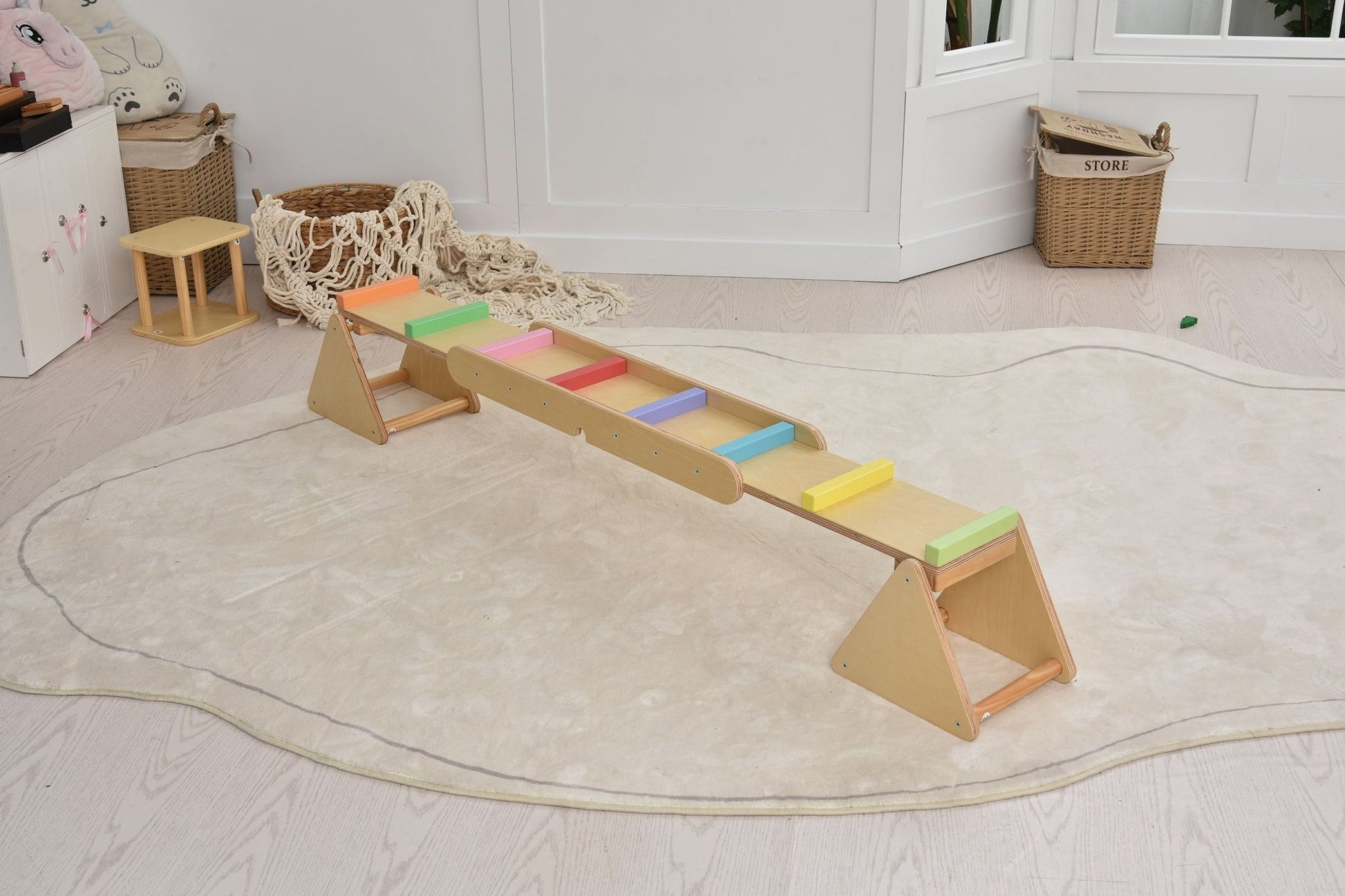 Wooden rainbow seesaw and balance beam - The Nurturing Nook