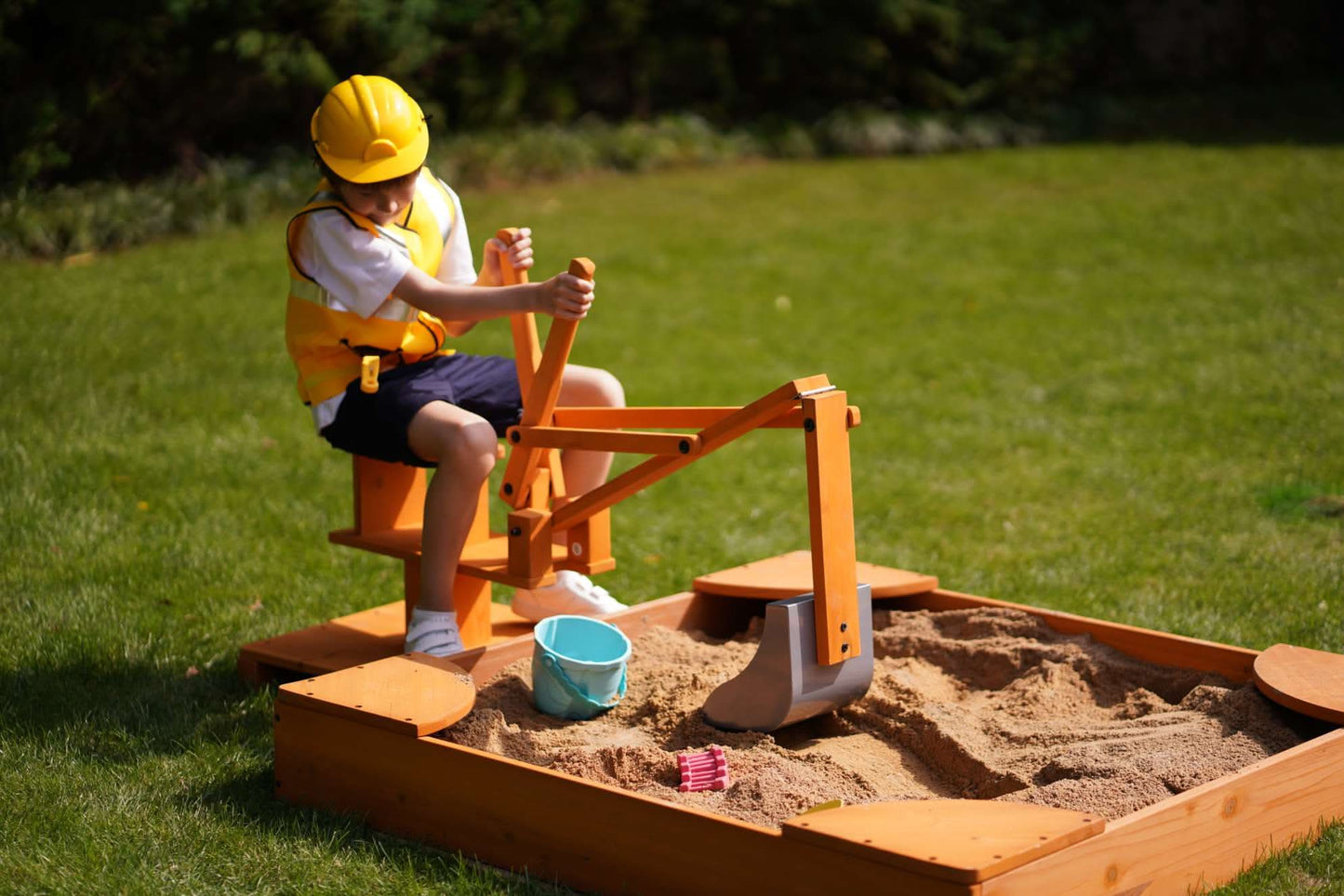 Wooden ride - on outdoor excavator for toddlers - The Nurturing Nook