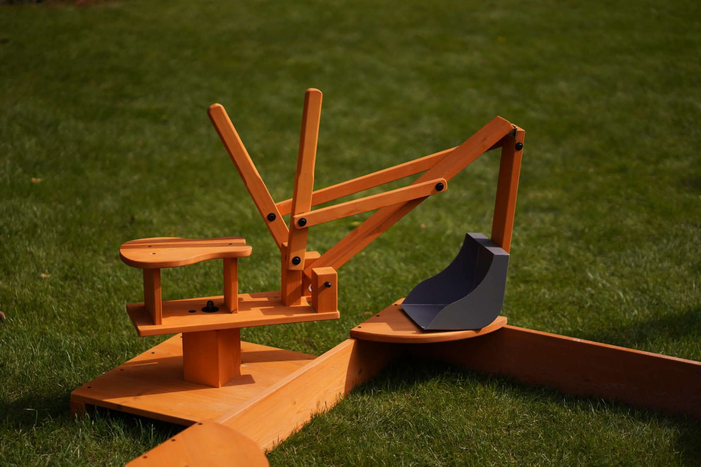 Wooden ride - on outdoor excavator for toddlers - The Nurturing Nook