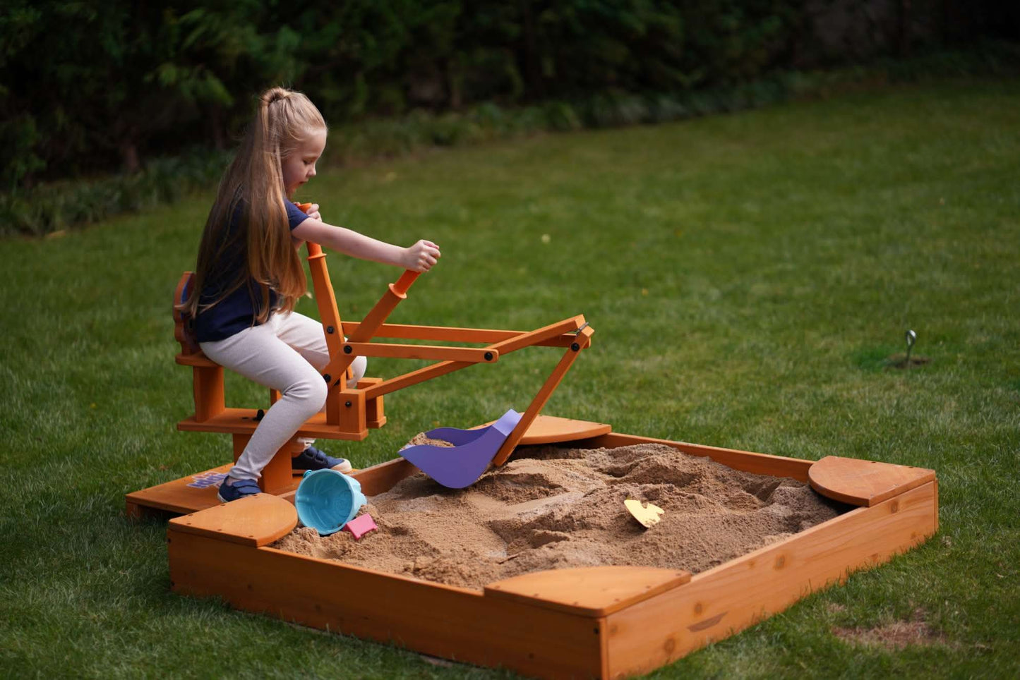 Wooden ride - on outdoor excavator for toddlers - The Nurturing Nook