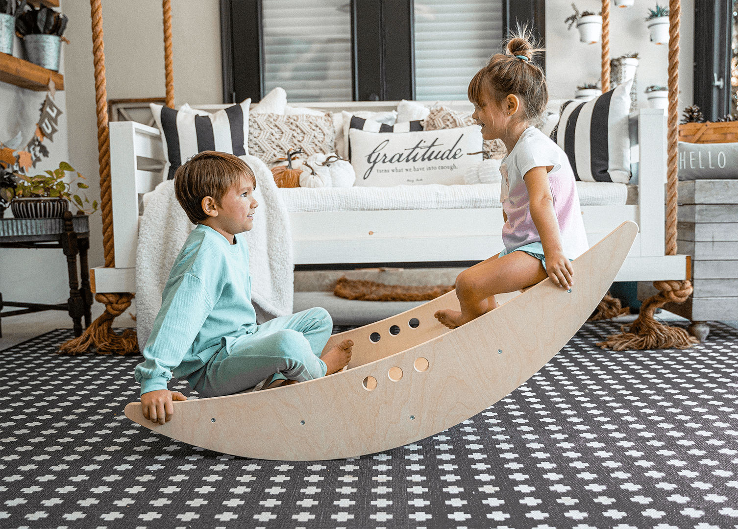 Wooden rocking boat and climber – gross motor play - The Nurturing Nook